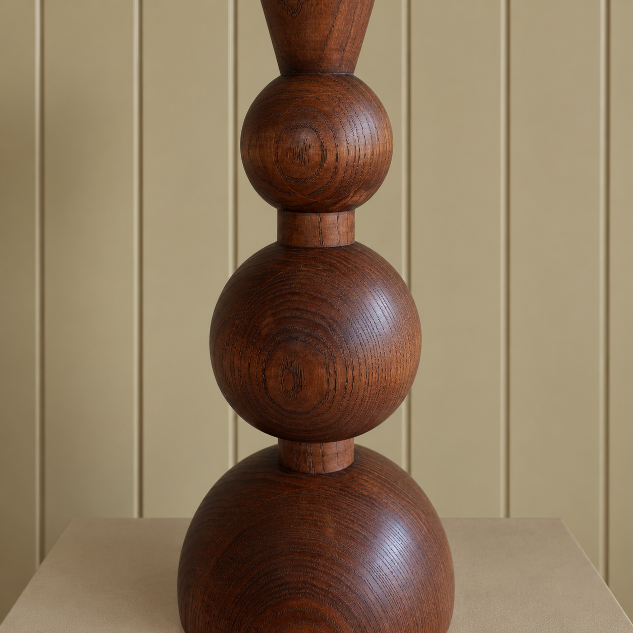 Walnut Turned Wood Sculpture on Beige Plinth.png