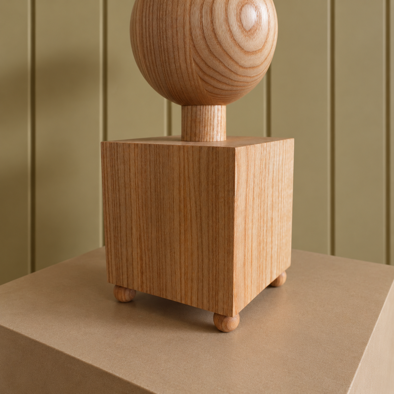 Styled Wooden Lamp Base on Plinth.png
