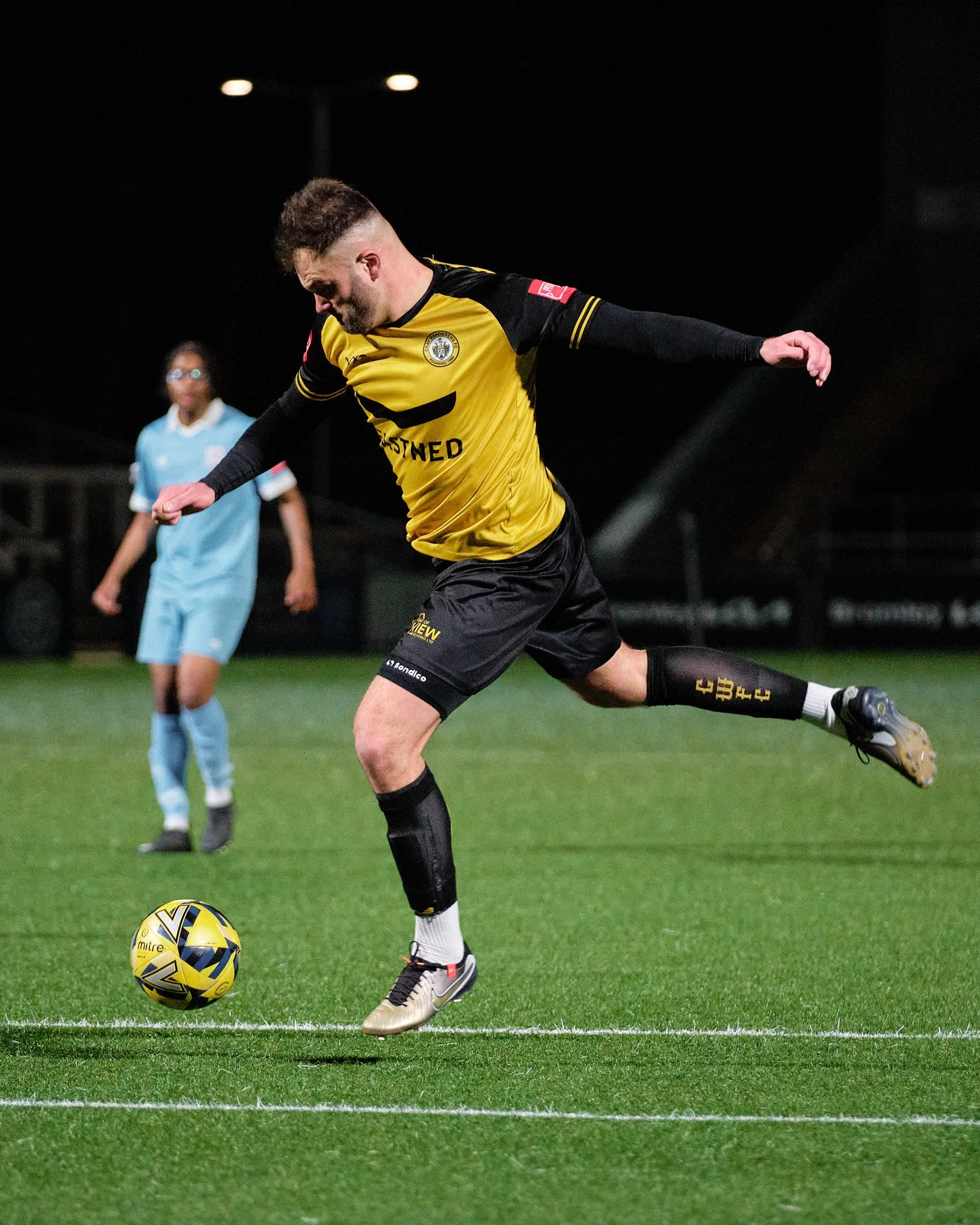 Gary Lockyer strikes a ball while playing for Cray Wanderers FC.