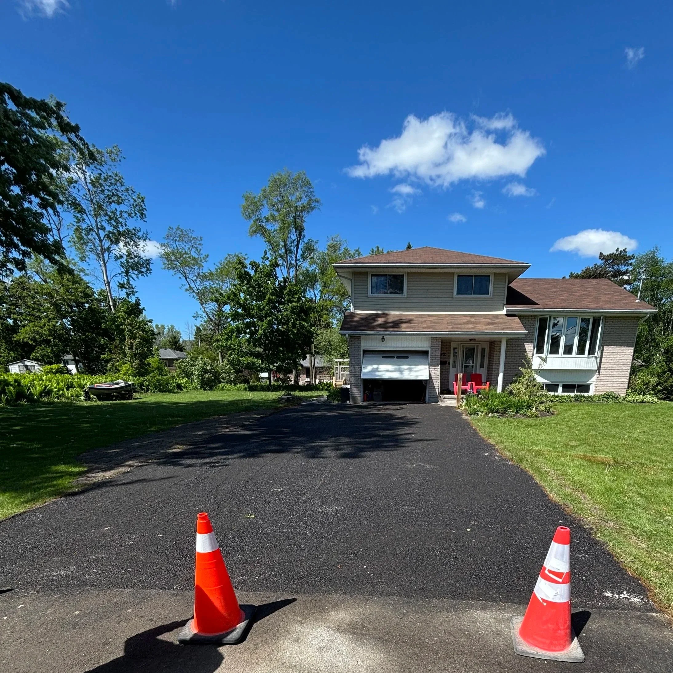 Old broken asphalt removed, recycled asphalt placed back in!  Another recycled asphalt driveway installed in Belleville Ontario.  Cost effective and easy to maintain!
