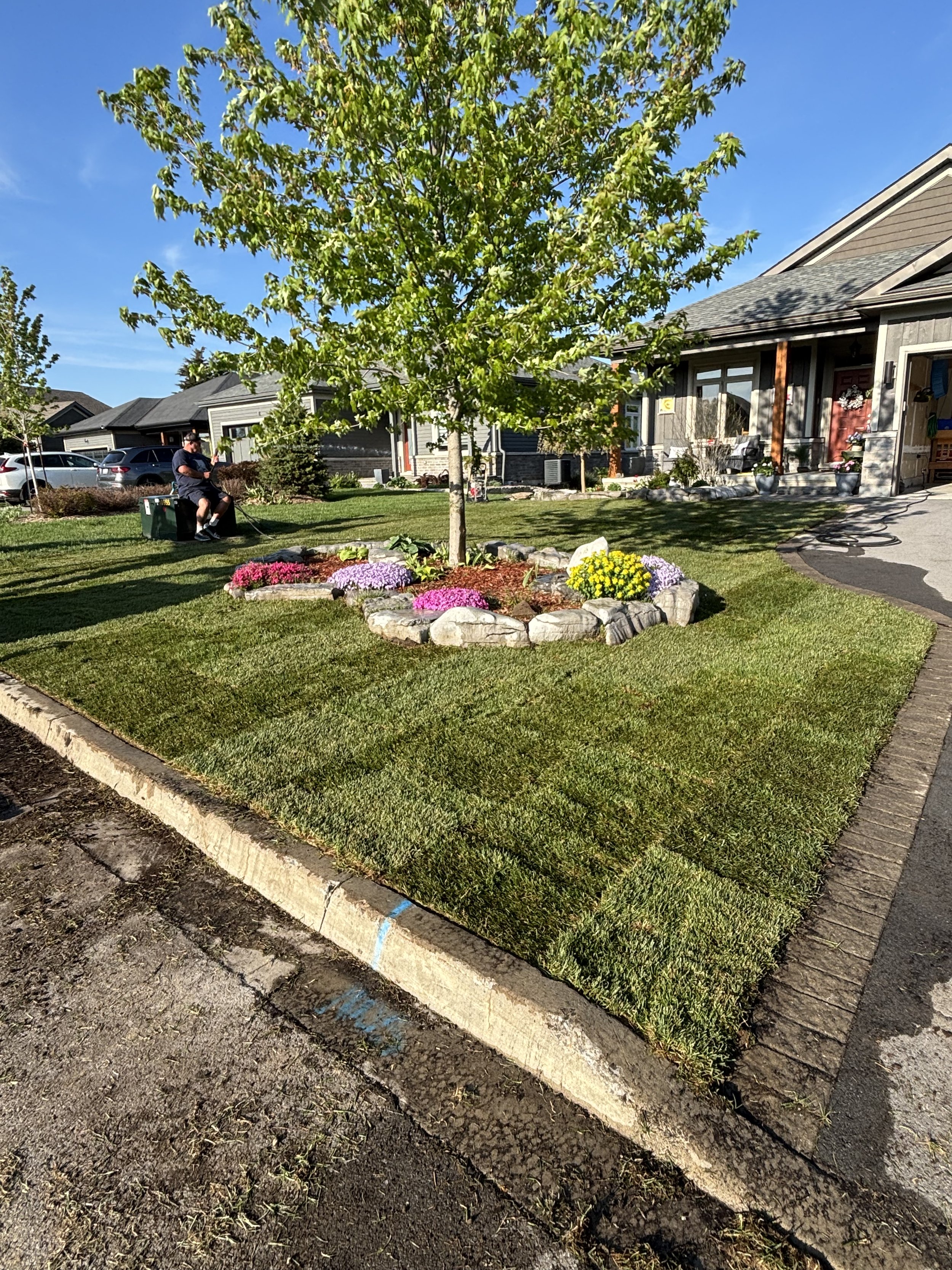 Your grass doesn’t grow in bad soil!  We removed the rocky backfill and replaced it with premium soil.  We then topped it with 1100 sqft of sod.  Green grass for years to come!