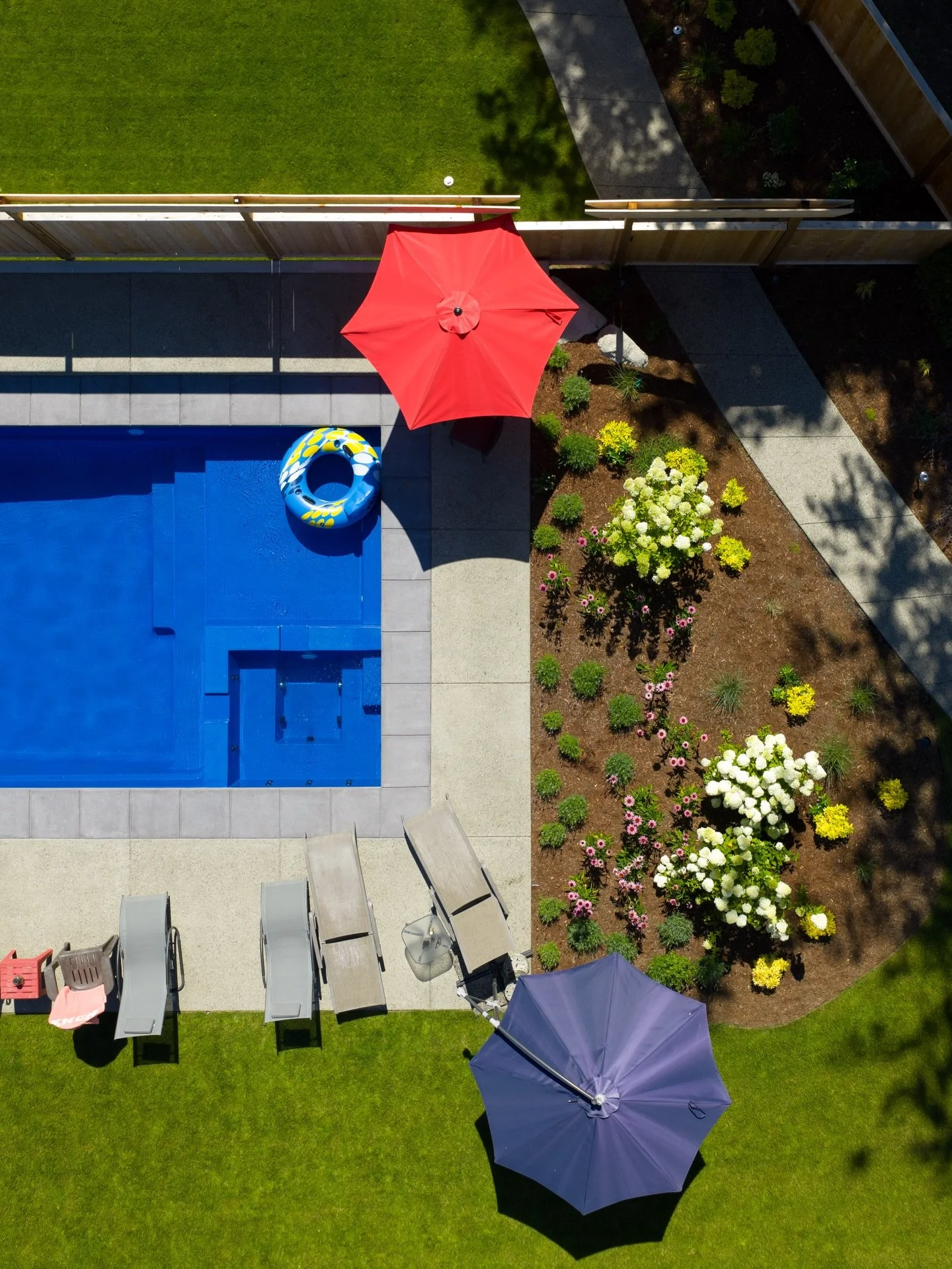 From a work-in-progress to a weekend sanctuary! 🏊☀️ This project was all about turning a complex build site into a seamless outdoor living experience. 

Knowing the family will enjoy the pool and the lush new lawns for generations makes all the heav