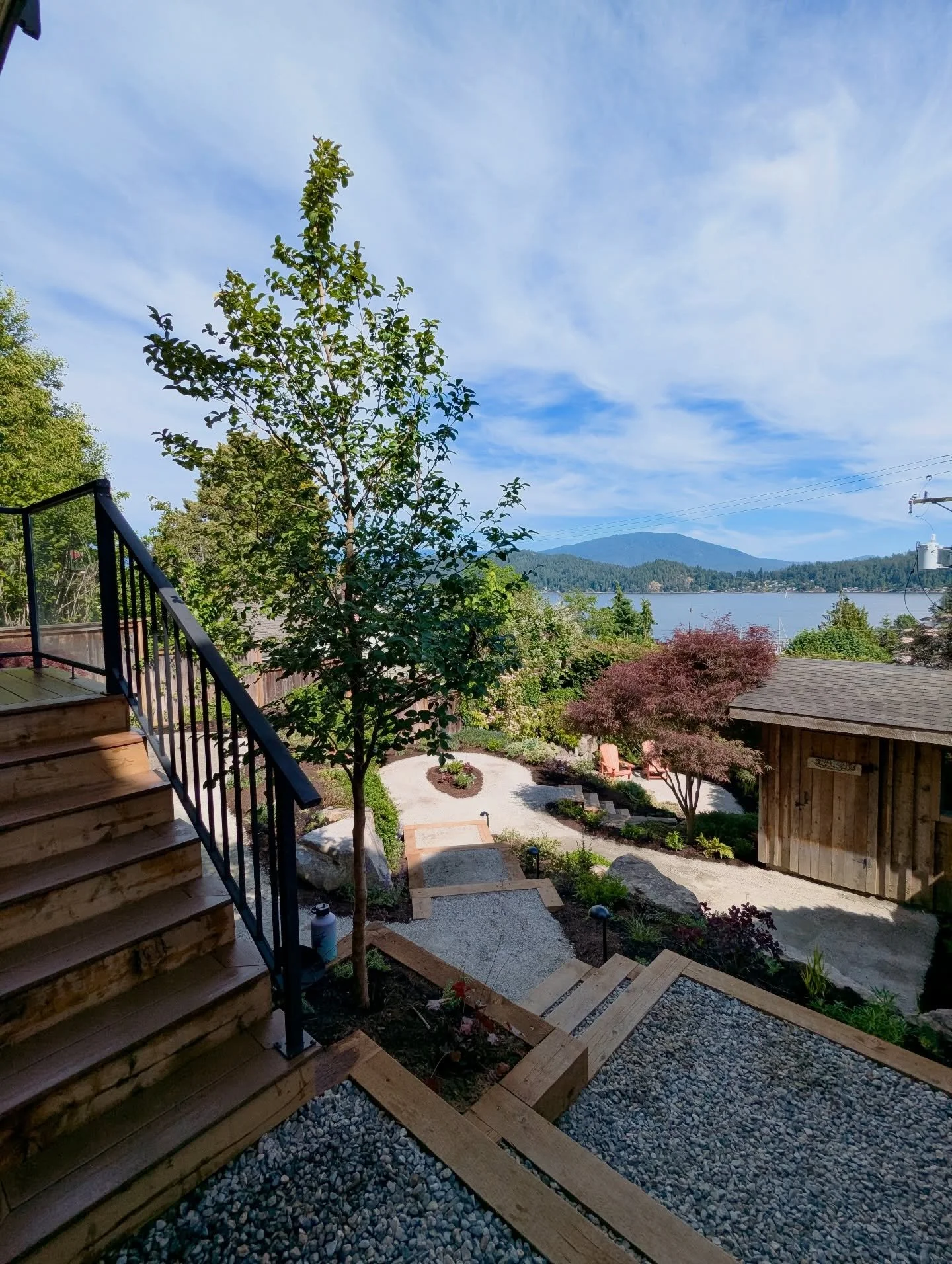 Re-visiting one of our projects from last season. Backyard entertaining, leveled up! 🌊✨ We transformed this sloped site into the ultimate tiered oasis, perfect for hosting friends against that stunning ocean backdrop.

With new timber-framed stairs 