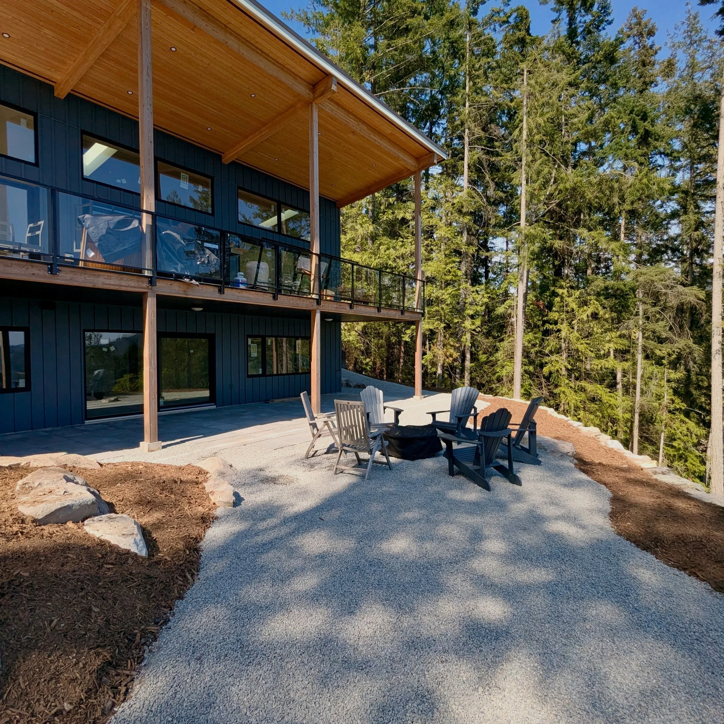 We designed this fire pit area with clean, modern lines to complement the architecture and let that incredible island backdrop take center stage. 🌊✨

Swipe to see the before 👀

@johnmintydesign 
@squareone.construction 

#HumanNatureLandscapes #Fir