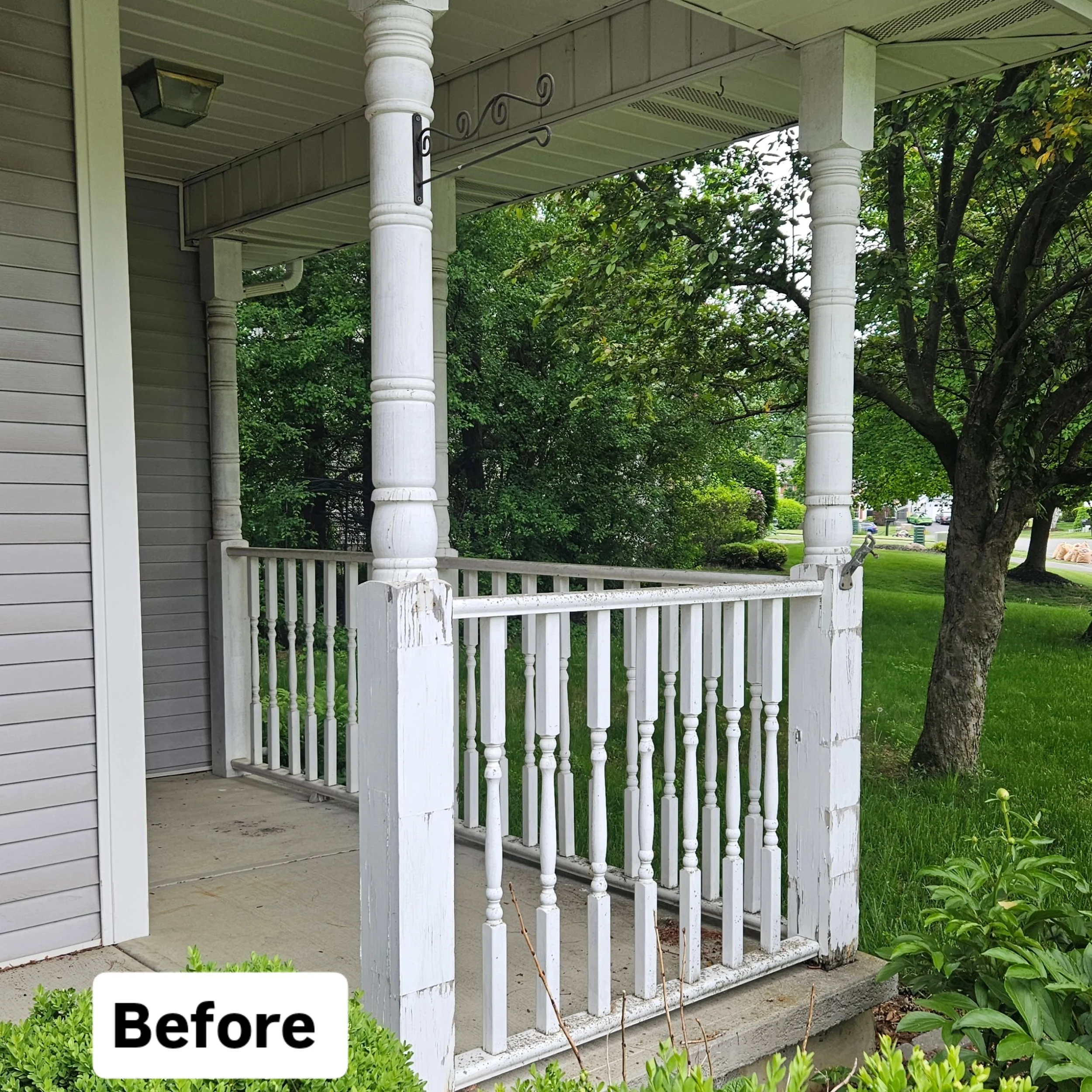 A fresh porch update can completely change the first impression of a home.

For this exterior refresh, we removed the old worn wood railing and upgraded the porch with clean white vinyl posts, white railing, black spindles, and new soffit. The black-