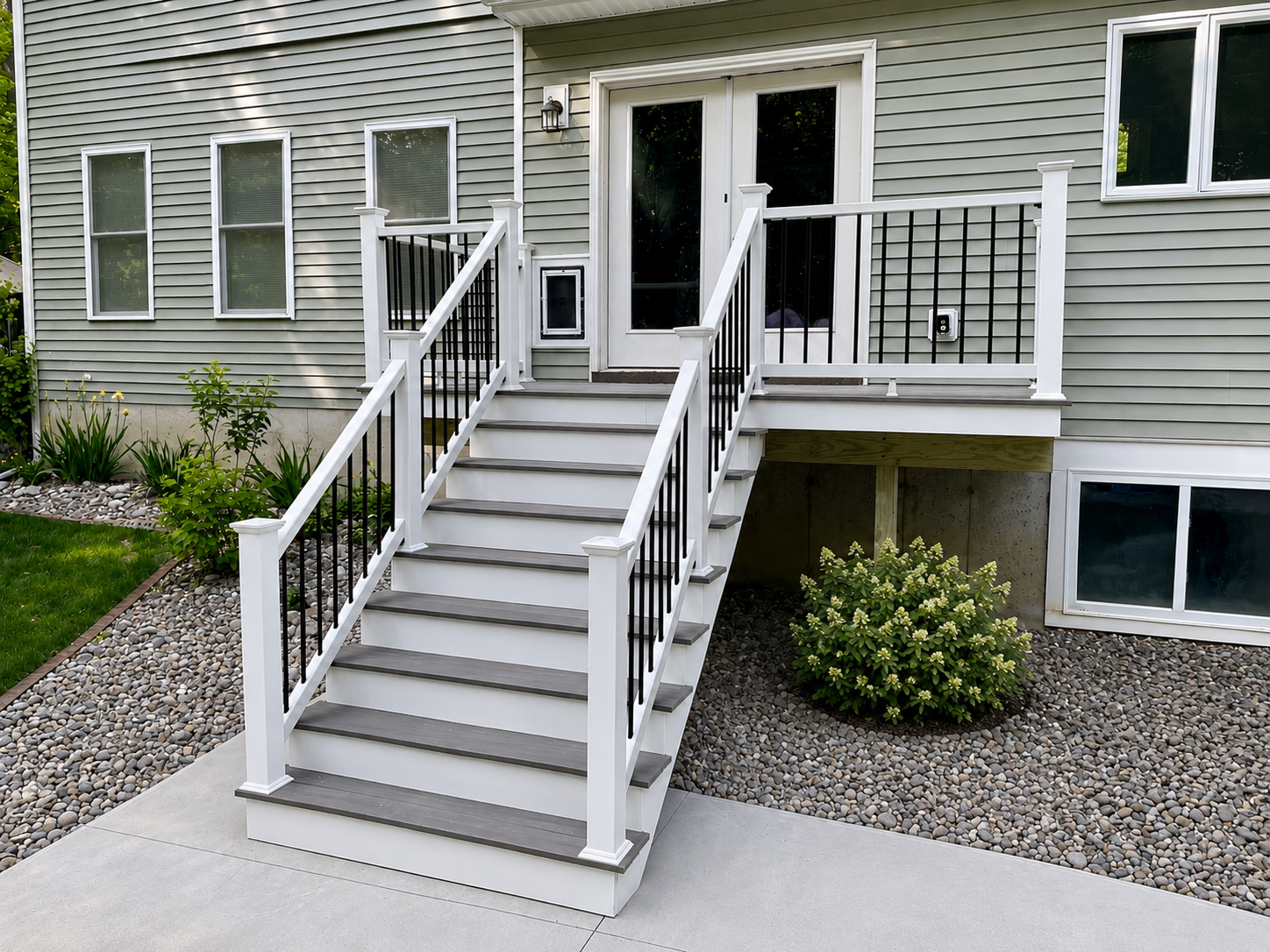 After/Finished Project
Complete deck stair rebuild by Regional Remodeling using Trex composite decking and matching Trex railing system. This custom exterior remodel created a clean, durable, low-maintenance outdoor entry with white railings, black b
