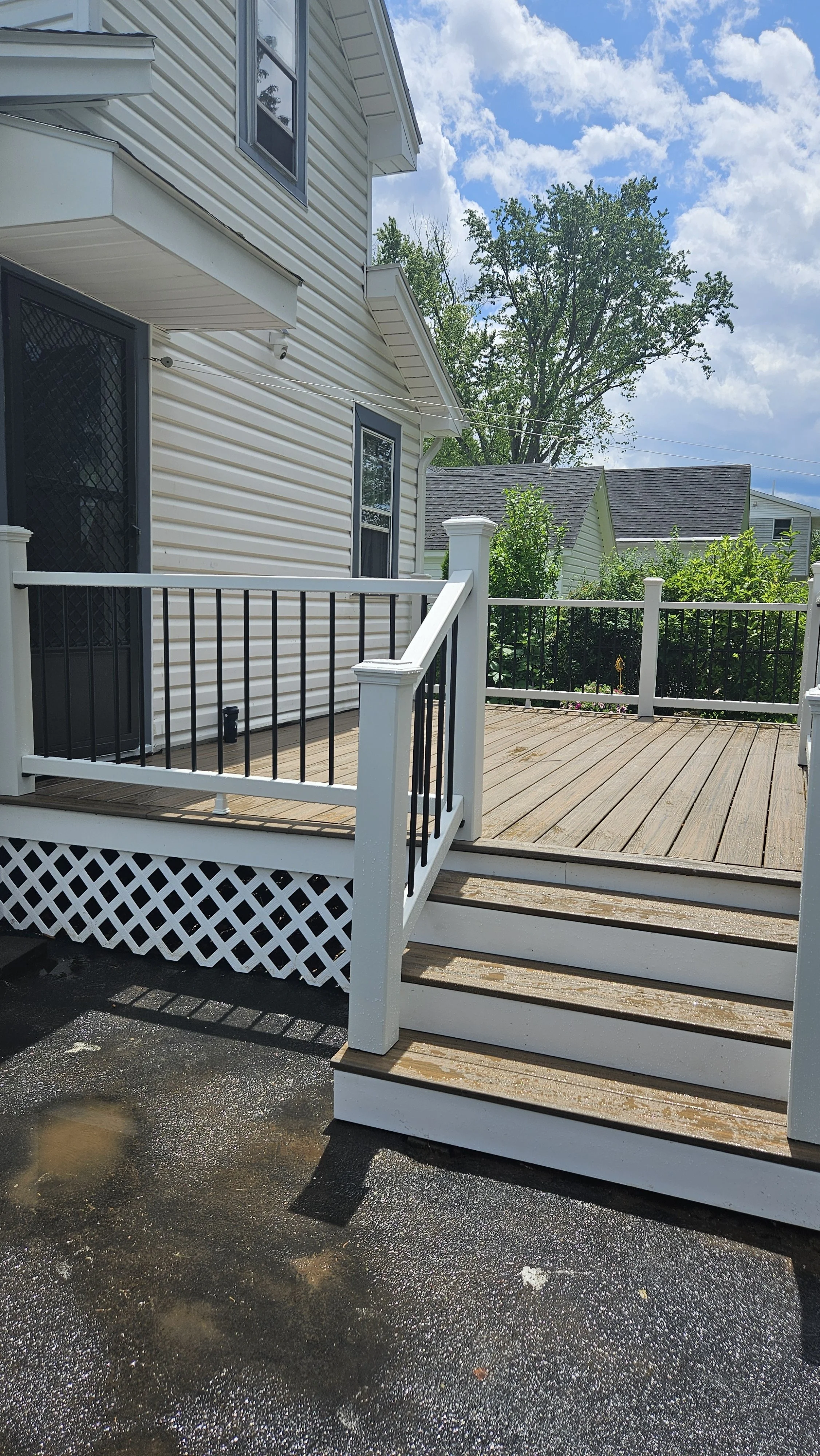 AFTER: New Trex deck with railings and steps completed in Scotia, NY