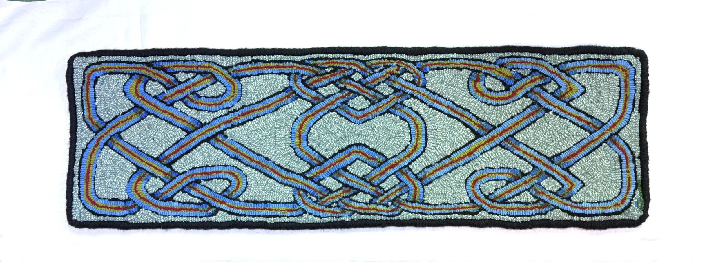 "Six Blue Knots, Two Large Hearts"
31.5" x 10"
(2025)