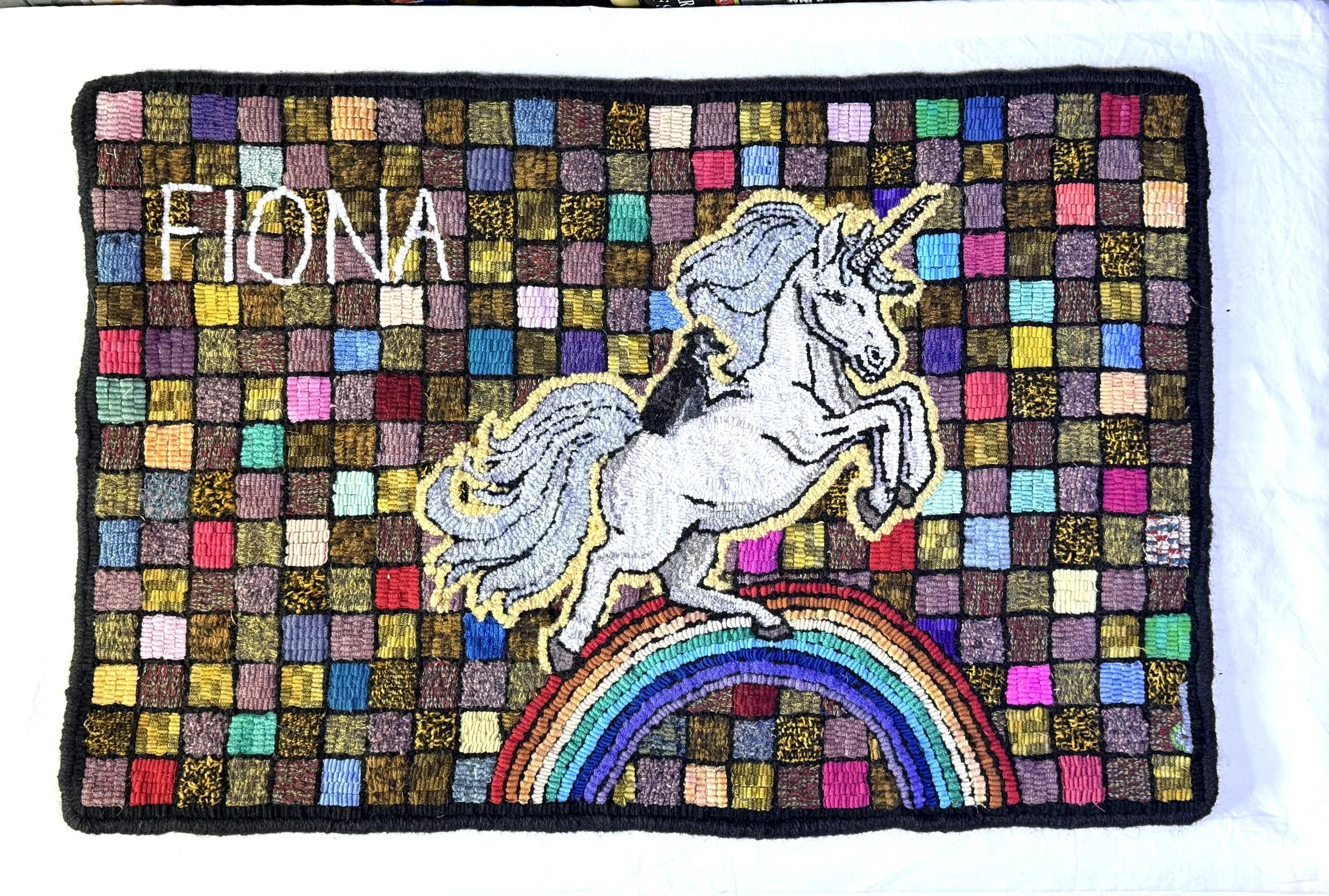 "Fiona." 31" x 21"       Yes, I know. Unicorn.  Fiona doesn't like dinosaurs.  Reba riding a Unicorn on a rainbow. 