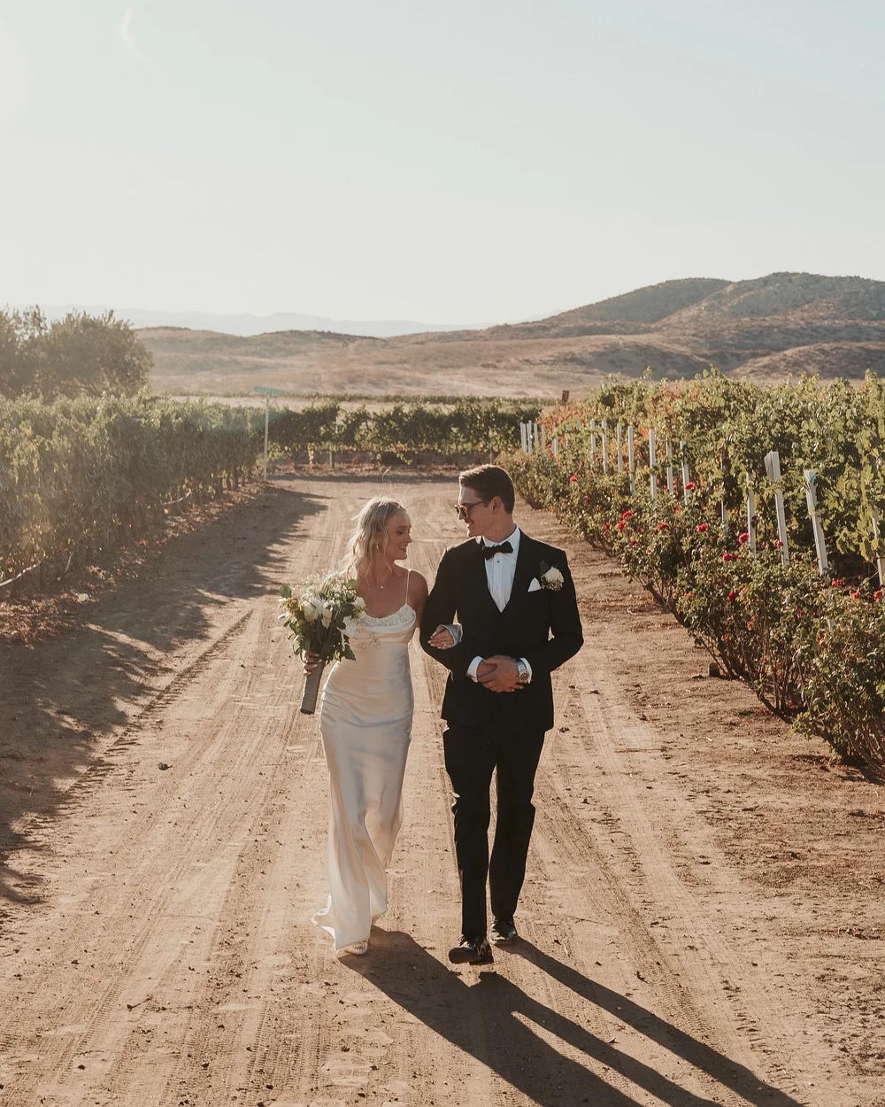 Which will age more beautifully&hellip; the wine from this vineyard, or these portraits from this very special day? Congrats to Jill and John for starting their journey together 🥂

Venue: @doffowineryweddingsandevents 
2nd Shooter: @jco.weddings 

#