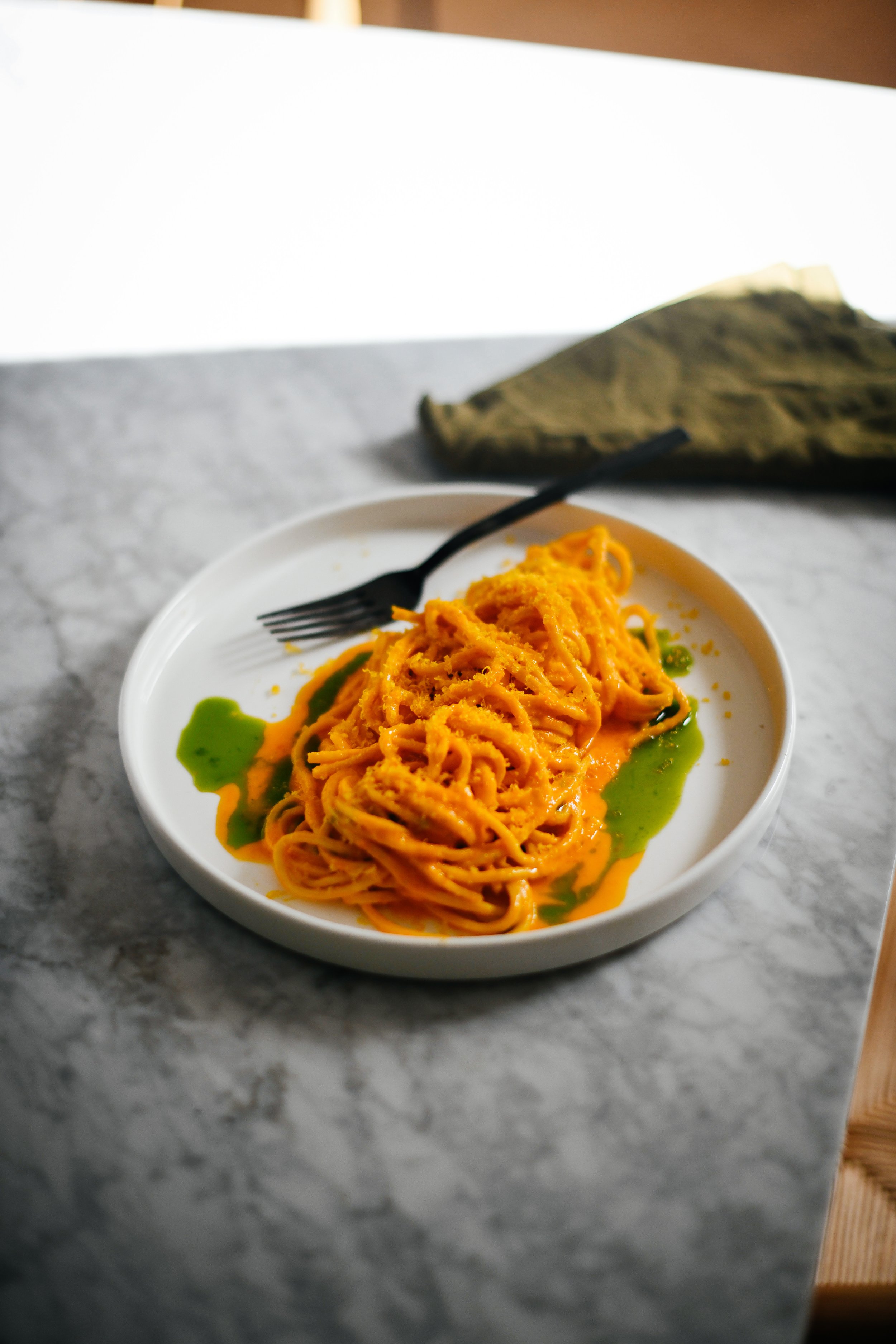 Spaghetti alla Chitarra with Yellow Tomato Sugo, Basil Oil and