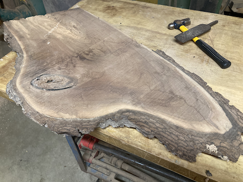 Front of the board with its big knot.