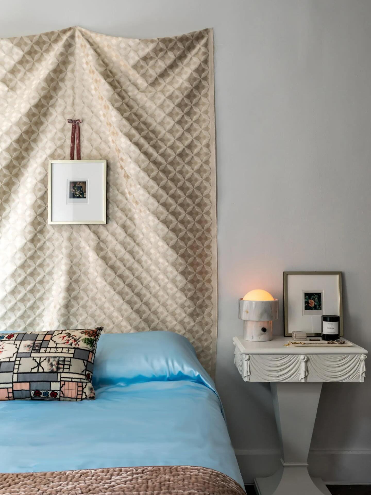 Vintage fabric and layered art in the home of @ellemcgrath in @archdigest photos by @franparente