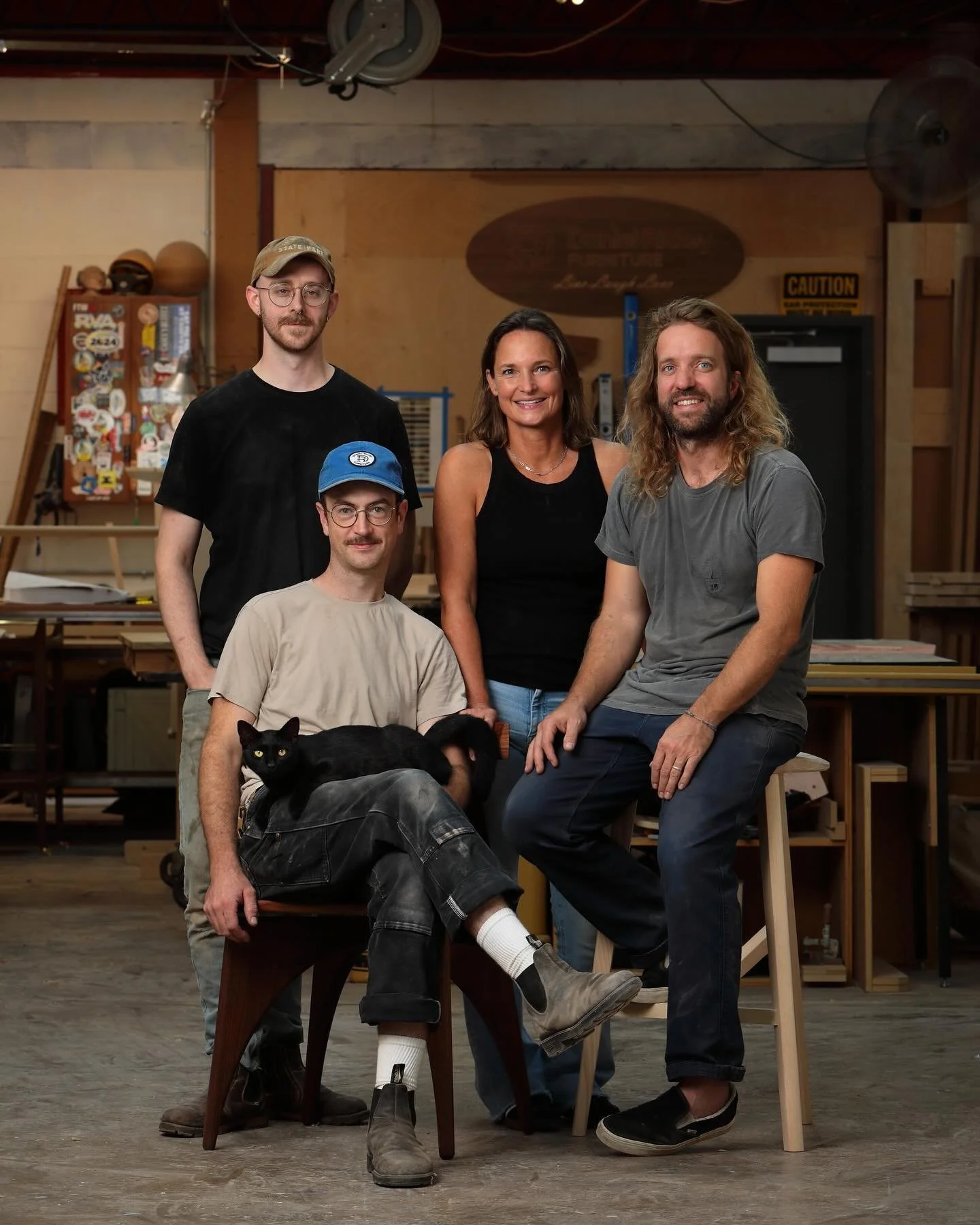 We build furniture.
.
.
Betsy, John, Corwin and Andrew are a crew of extremely talented folks that care so much about the job at hand. They are kind, funny and just all around good people. 
.
We love what we do, and we love Dirty the shop cat.
.
Firs