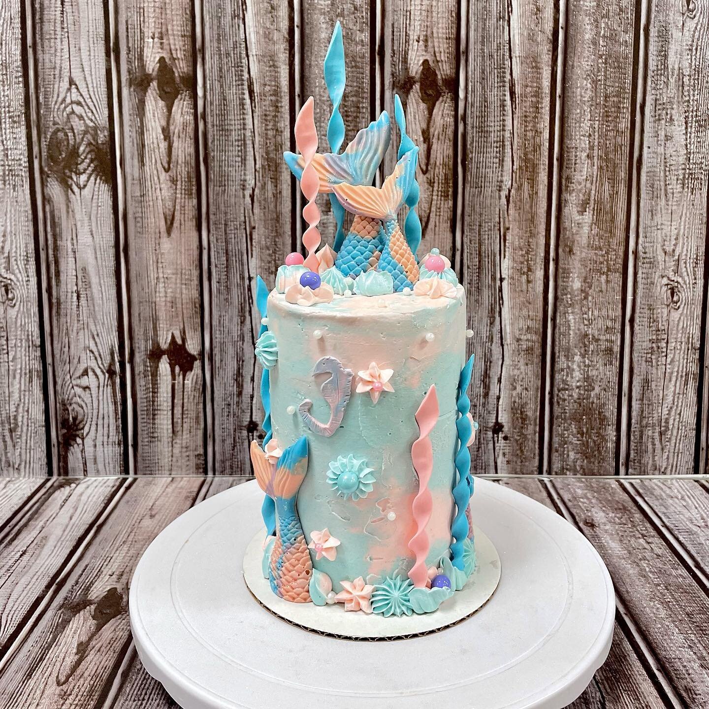 I&rsquo;m obsessed with tall cakes!! This beaut is a miniature remake of the sprinkle-filled mermaid cake from a couple weeks ago. How mini? Swipe to see a size comparison! 
&mdash;&gt;

This pretty got lots of love and attention when I posted it, en