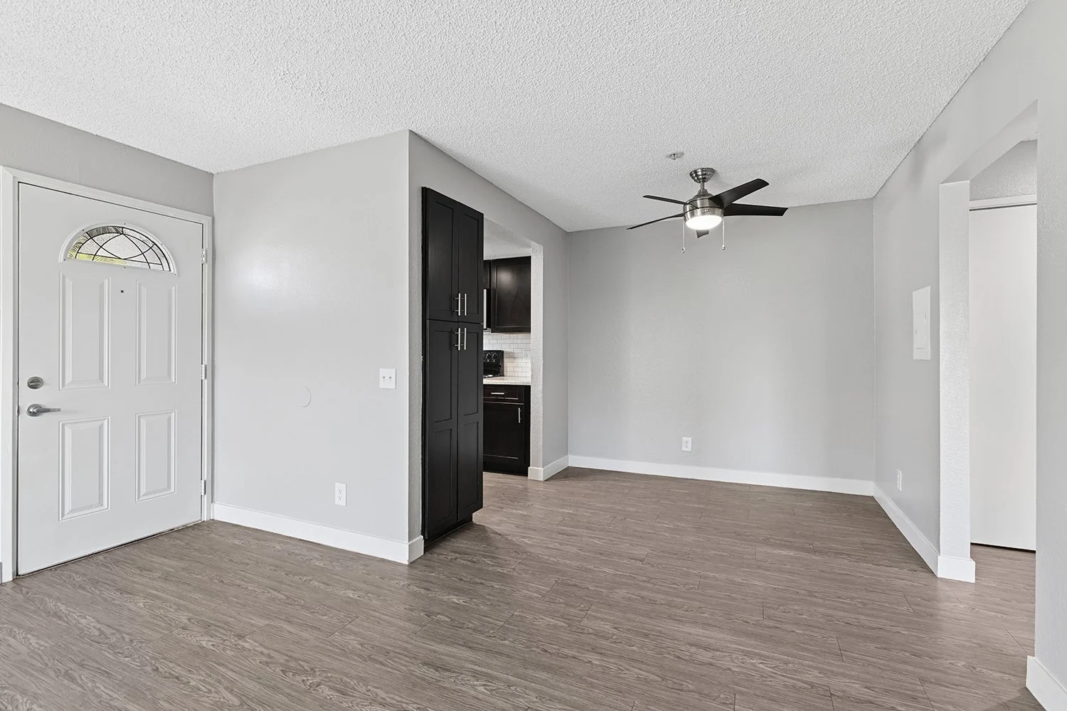 Living room in Citrus Heights 1 Bedroom apartment home with plenty of space, a dining nook, and modern updated kitchen. 