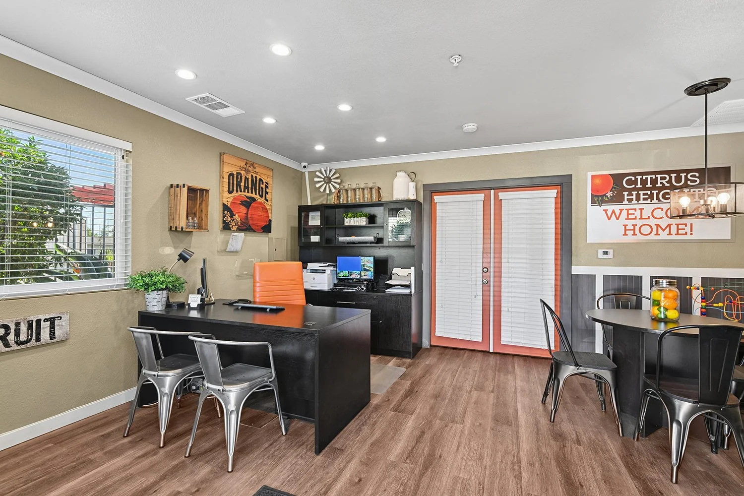 Charming Leasing Office at Citrus Heights with plank flooring. 