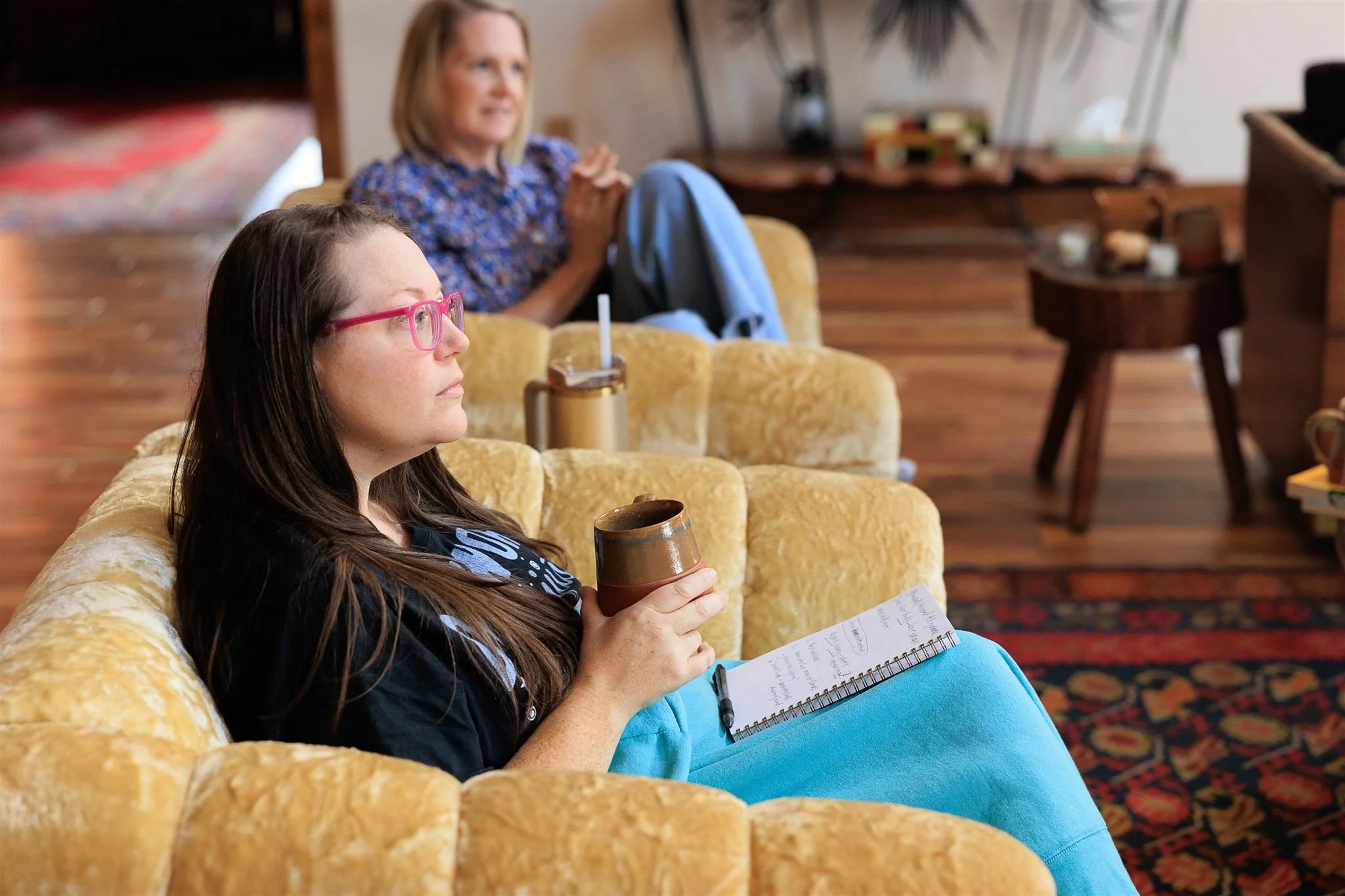 Melanie listening at fireplace.jpg