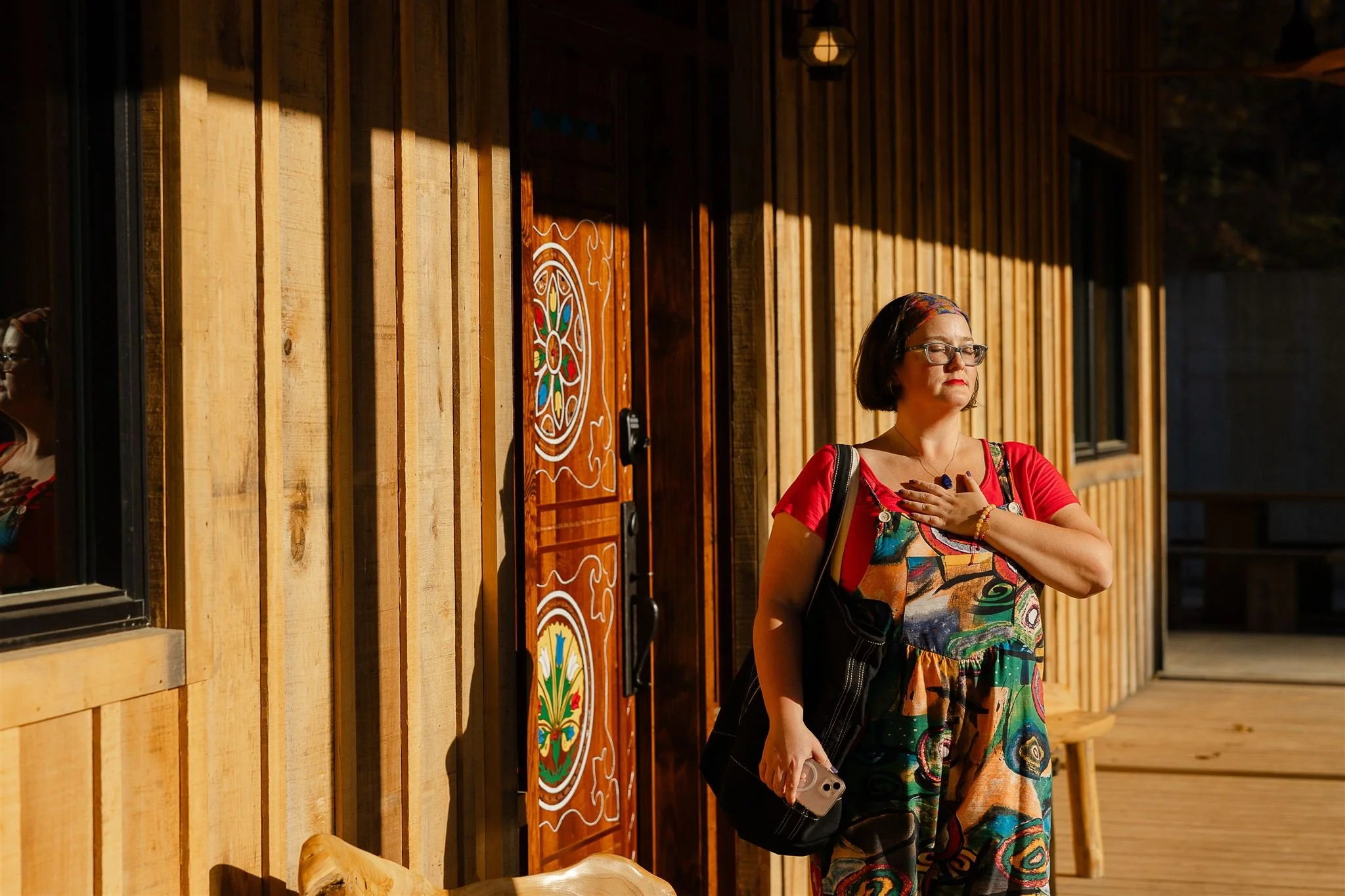 Kathryn in sun on front porch.jpg