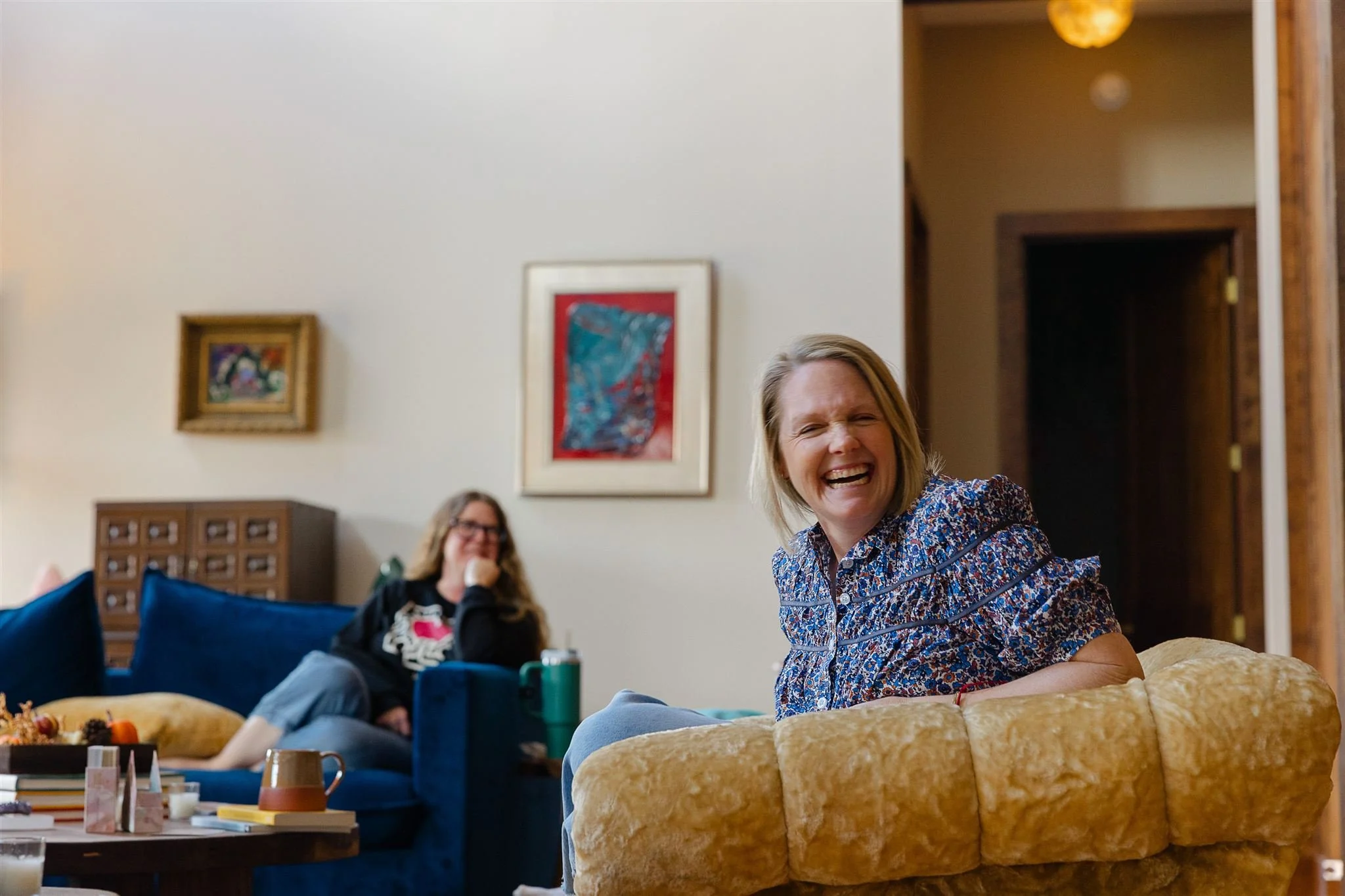 Katie laughing at fireplace.jpg