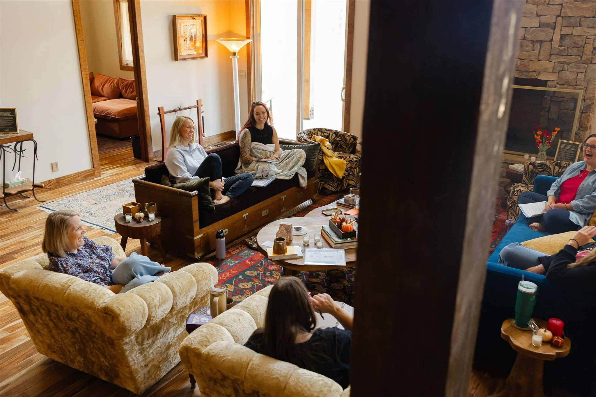 Laughing around fireplace from stairs.jpg