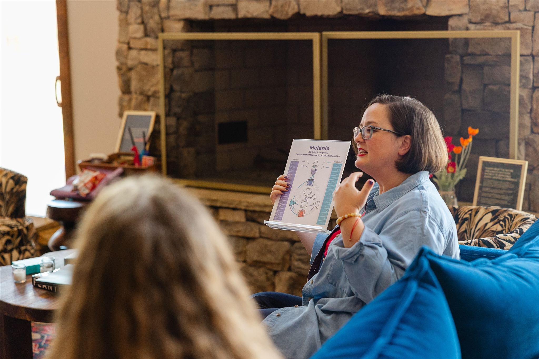 Kathryn teaching at fireplace.jpg