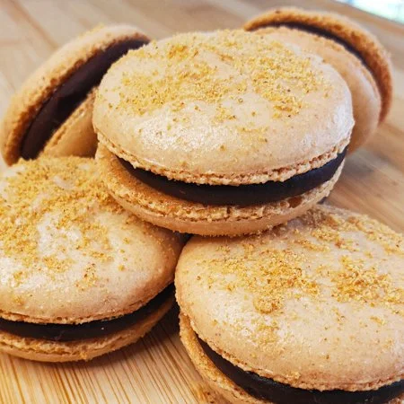 close up of a stack of s'mores macarons