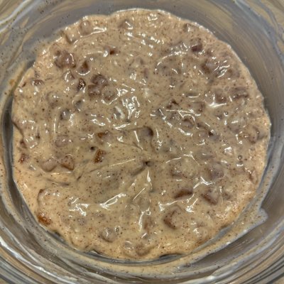 caramel apple cheesecake filling in a glass bowl