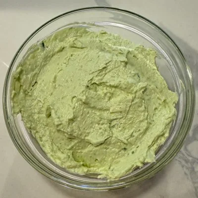 sour cream and onion cream cheese spread in a bowl