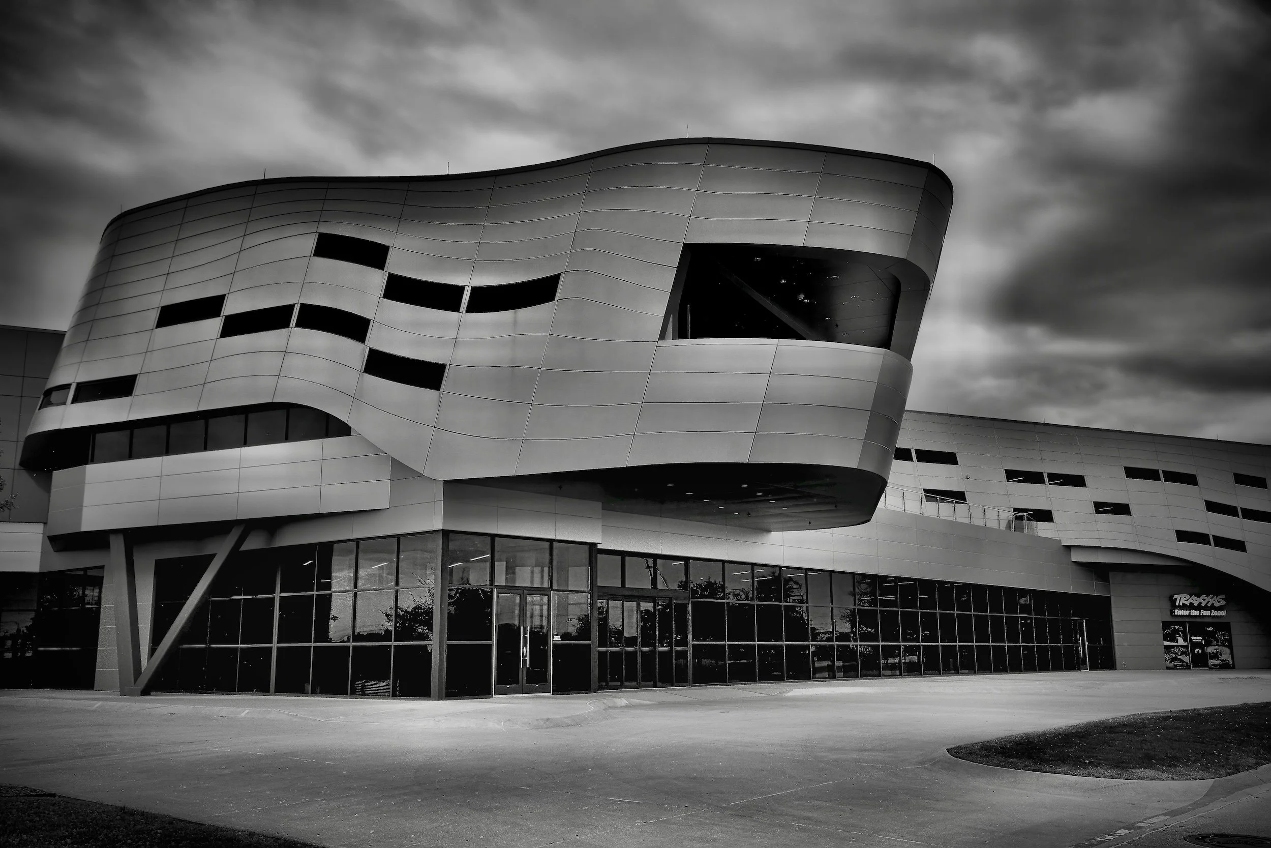 " Driven " Modern lines and bold reflections capture the spirit of innovation, ambition, and forward motion.