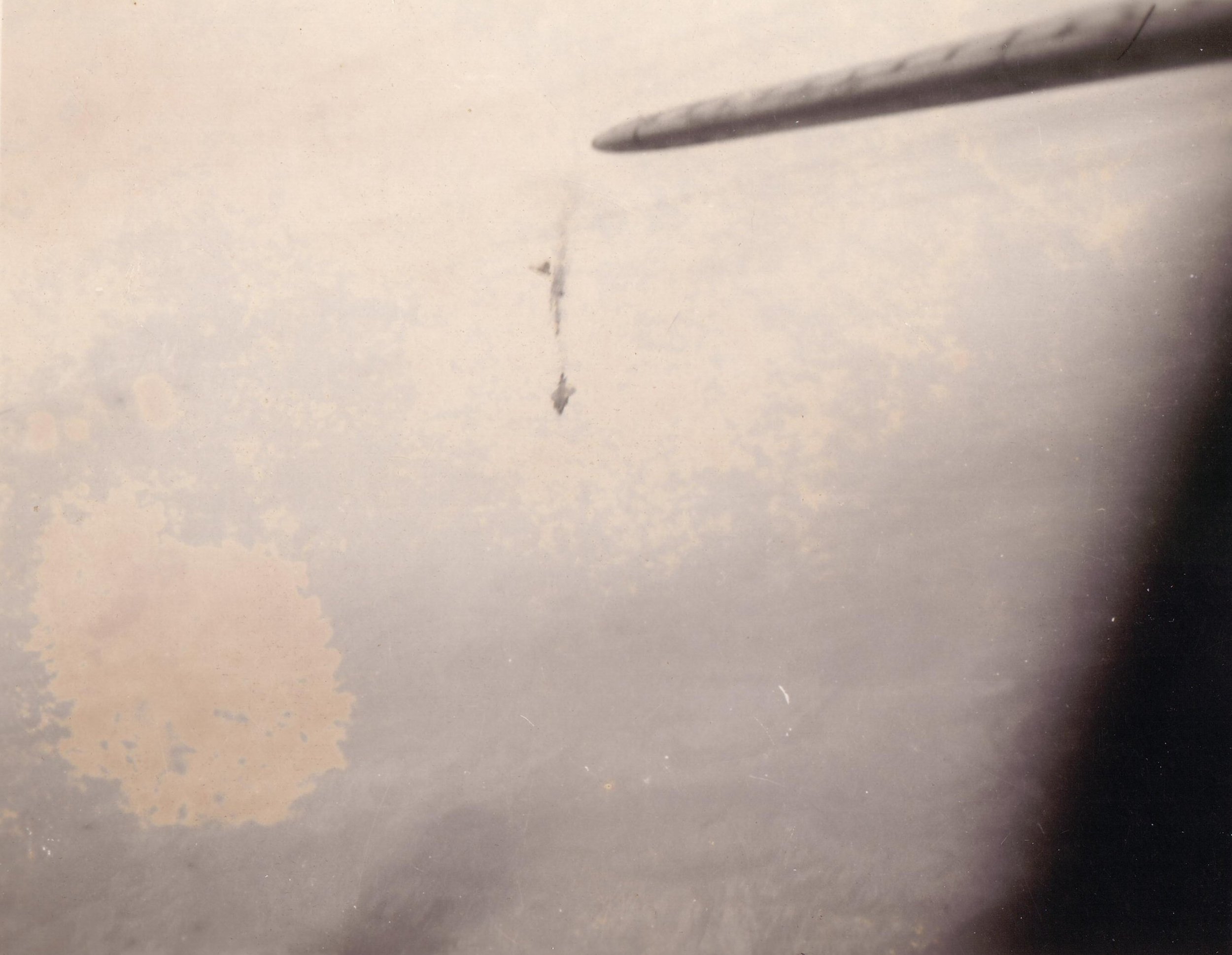 Photo of Mr. Lucky losing the tail section and falling from the sky with the loss of all crew members. Gentis could've been on this plane but fate intervened.