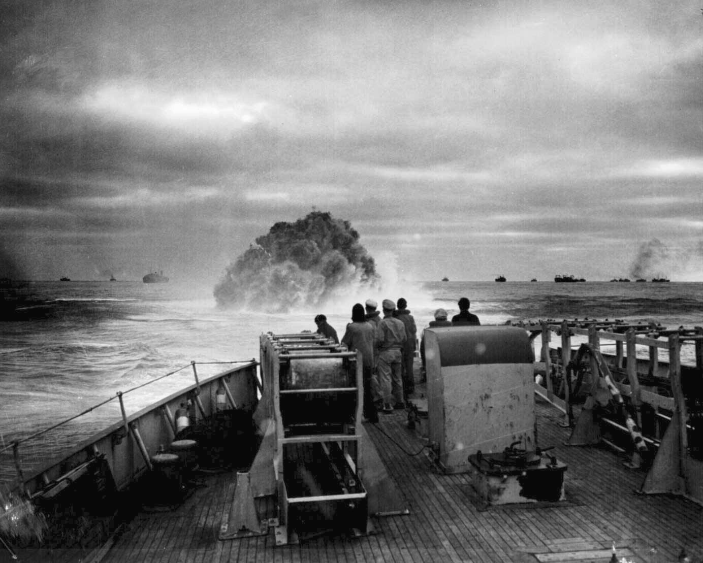 The US Coast guard would provide over 225,000 men during WW2. Here, the USS Spencer is defending a convoy against German submarines by using depth charges to sink or keep them at bay.