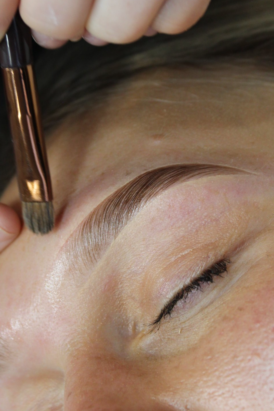 Close-up of a girl after getting a brow lamination, brow thread and hybrid dye colour service done at Face Avenue, in Marion 5043, adelaide, south australia