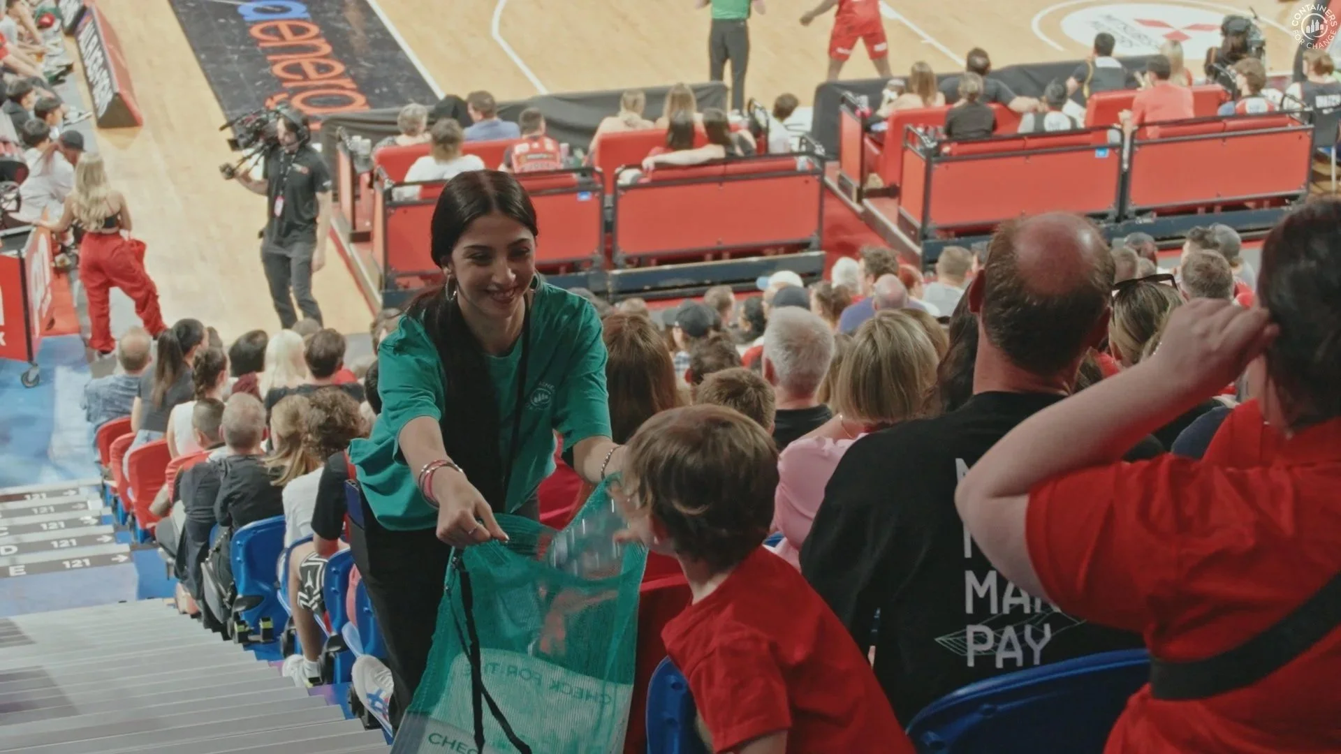 Containers for Change staff collecting containers from fans during a Perth Wildcats sponsorship activation