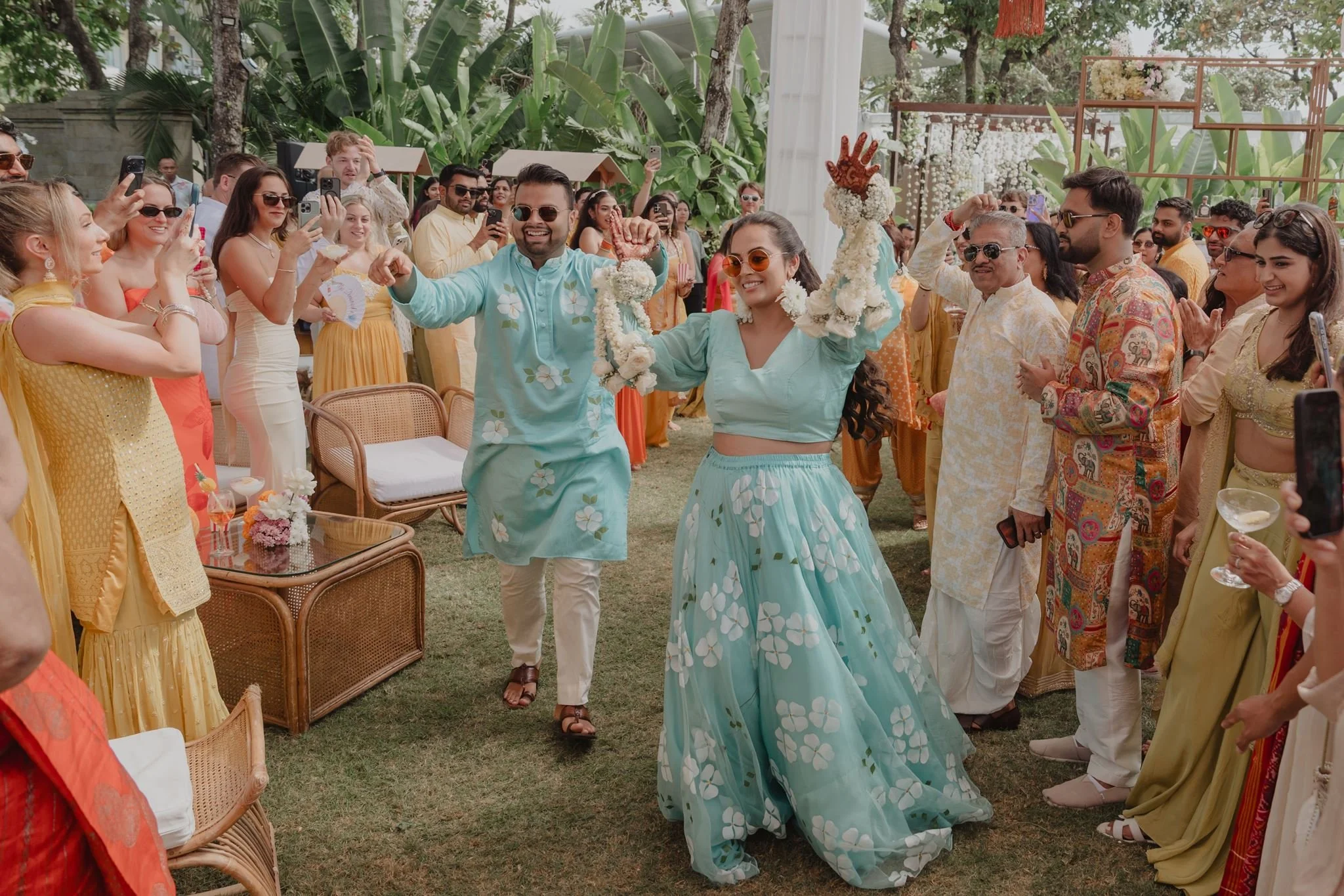 Bride and groom celebrating their Flower Haldi ceremony at an Indian wedding in Bali