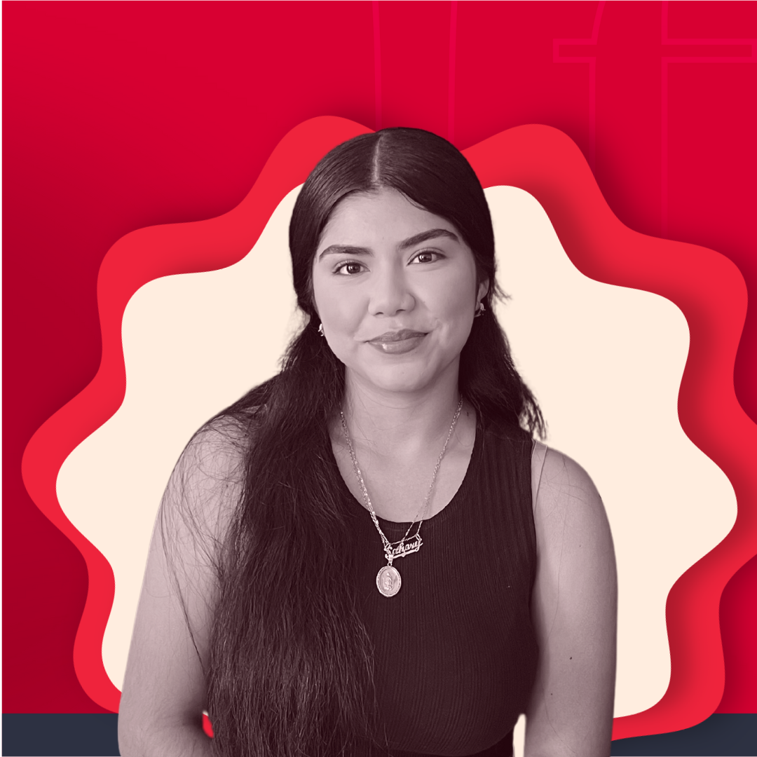 A woman with long dark hair, wearing a black sleeveless top, a necklace, and a smartwatch, standing against a digitally edited background with red and cream-colored abstract shapes