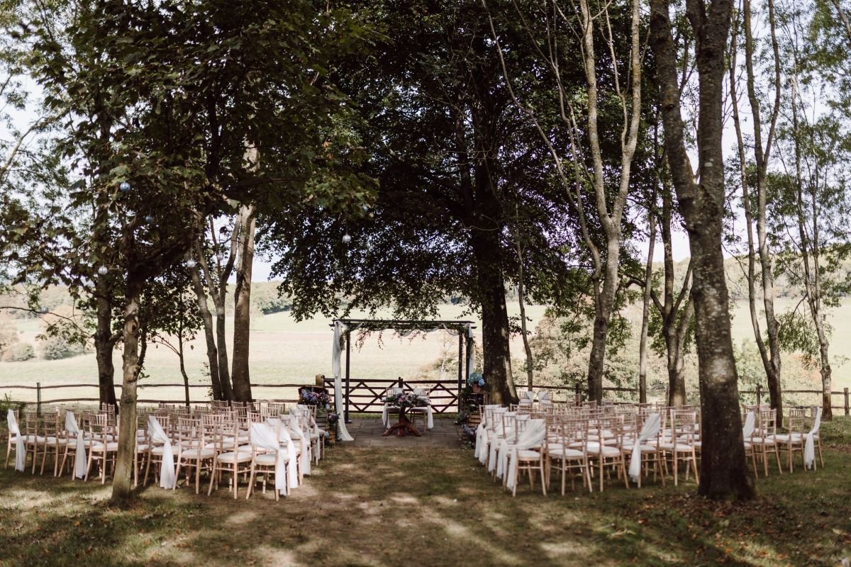 Cissbury barn outdoor ceremony setup wedding sussex florist.jpg