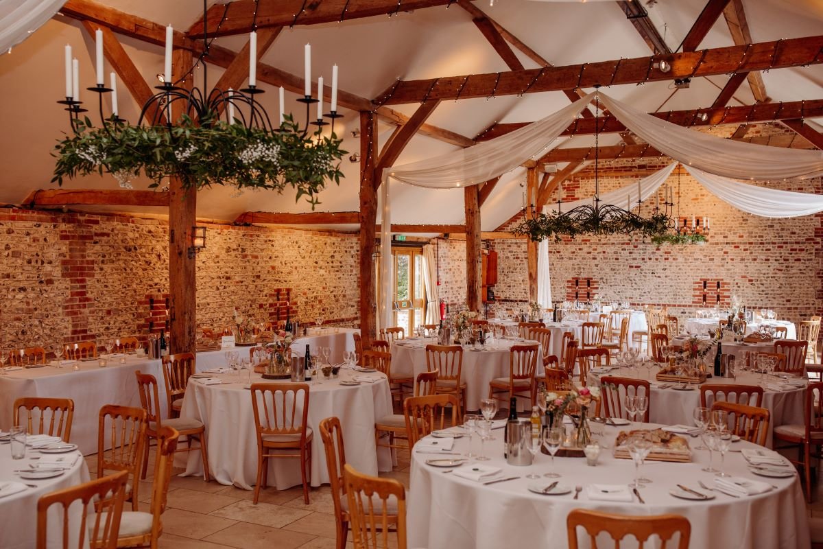 upwaltham barn reception tables sussex wedding florist.jpg