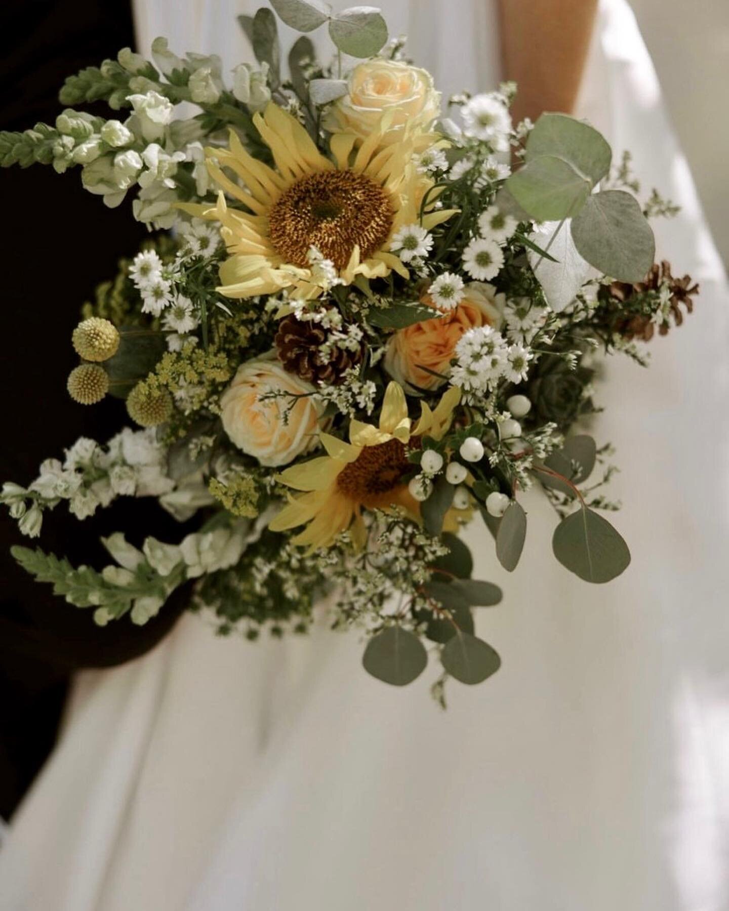 I love it when a couple come in with a strong view on a flower or colour to build their wedding around! Something meaningful or something they just love, it makes designing bespoke weddings such fun. 

For Phoebe it was sunflowers and the late August