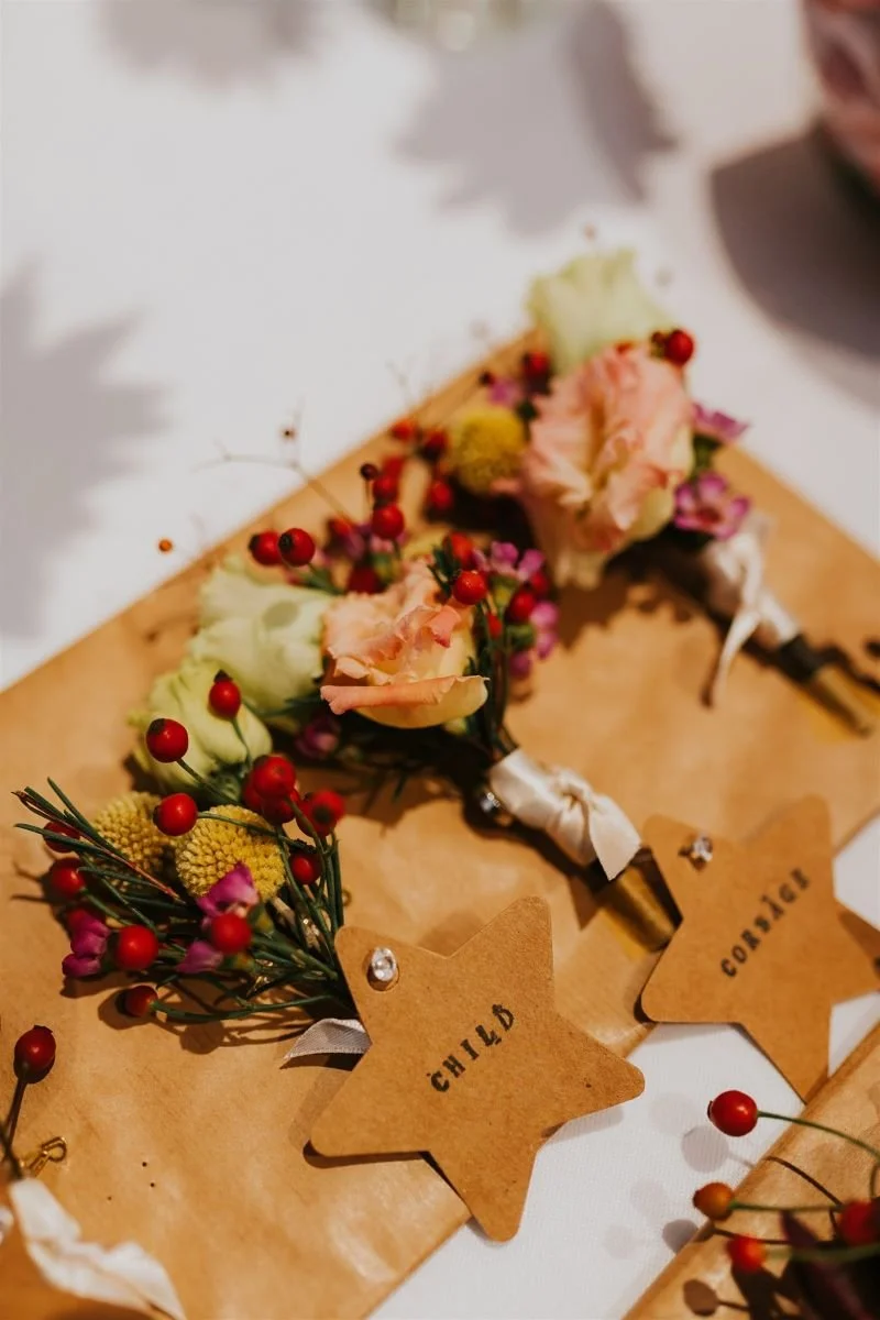 pelham house colourful buttonholes.jpg