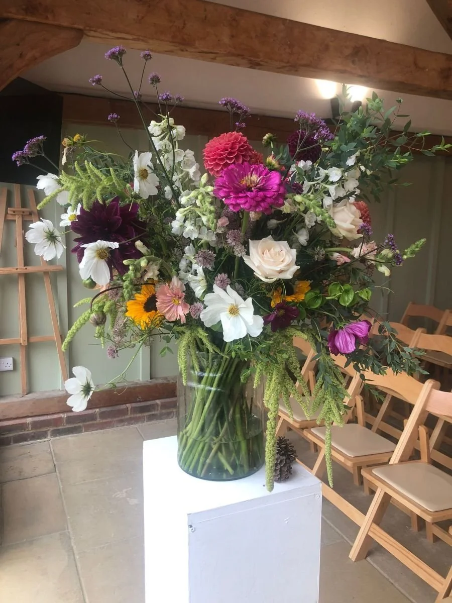 bmf_funeral large vase flowers hassocks.jpg