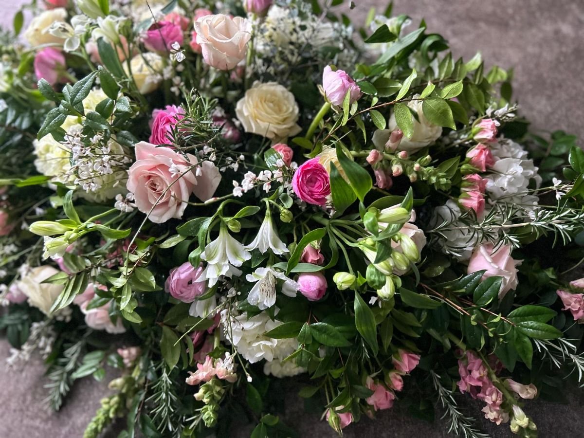 bmf_pastel spray funeral flowers sussex florist side view.jpg