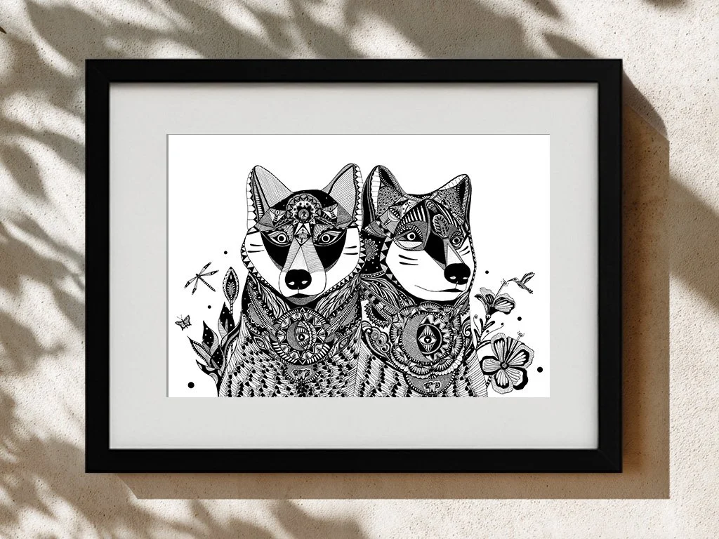 Black and white artistic illustration of two wolves with intricate patterns, surrounded by flowers, leaves, bugs, and decorative elements, in a black frame.