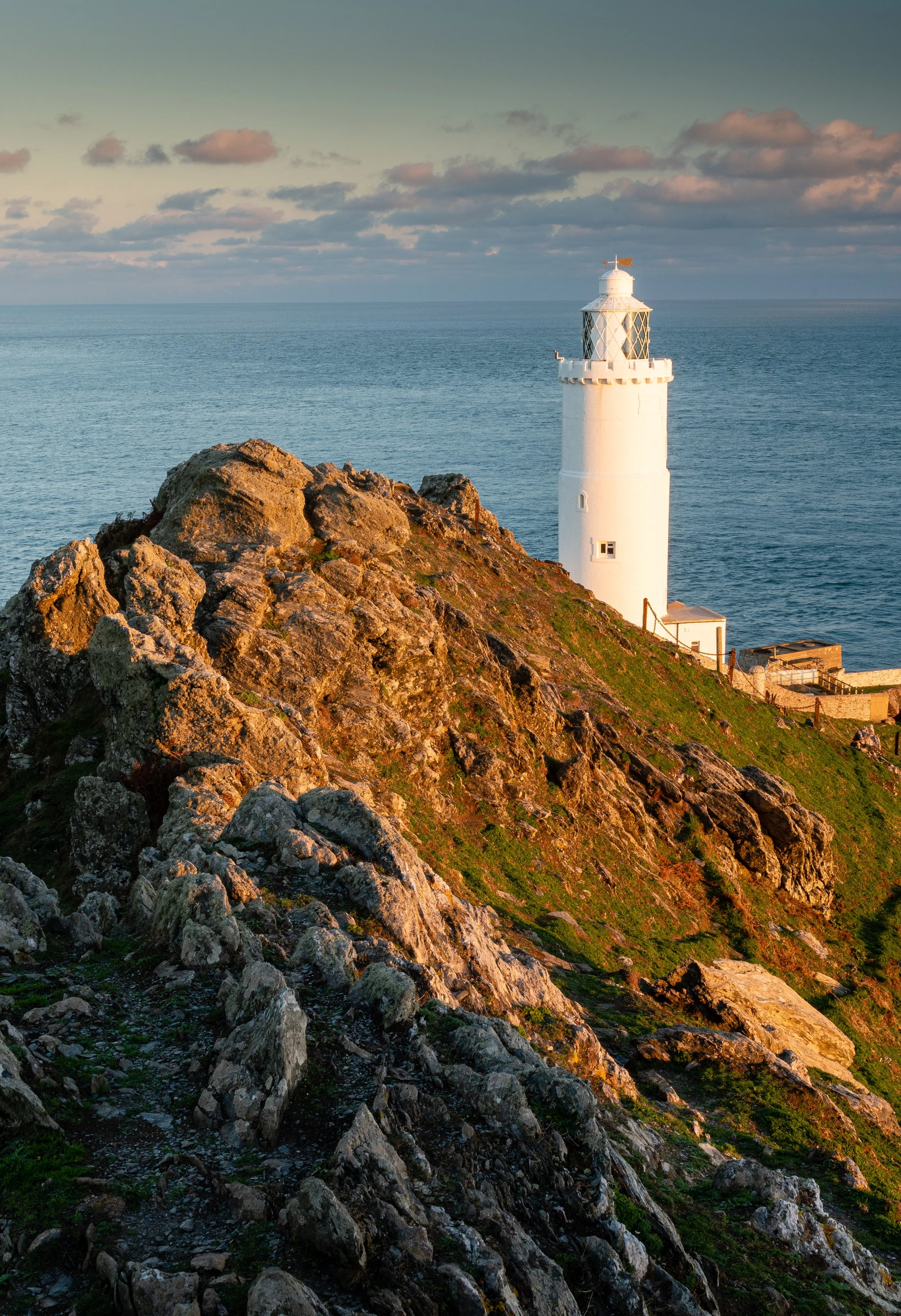 Orange light just before sunset at Start Point Lighthouse, Devon