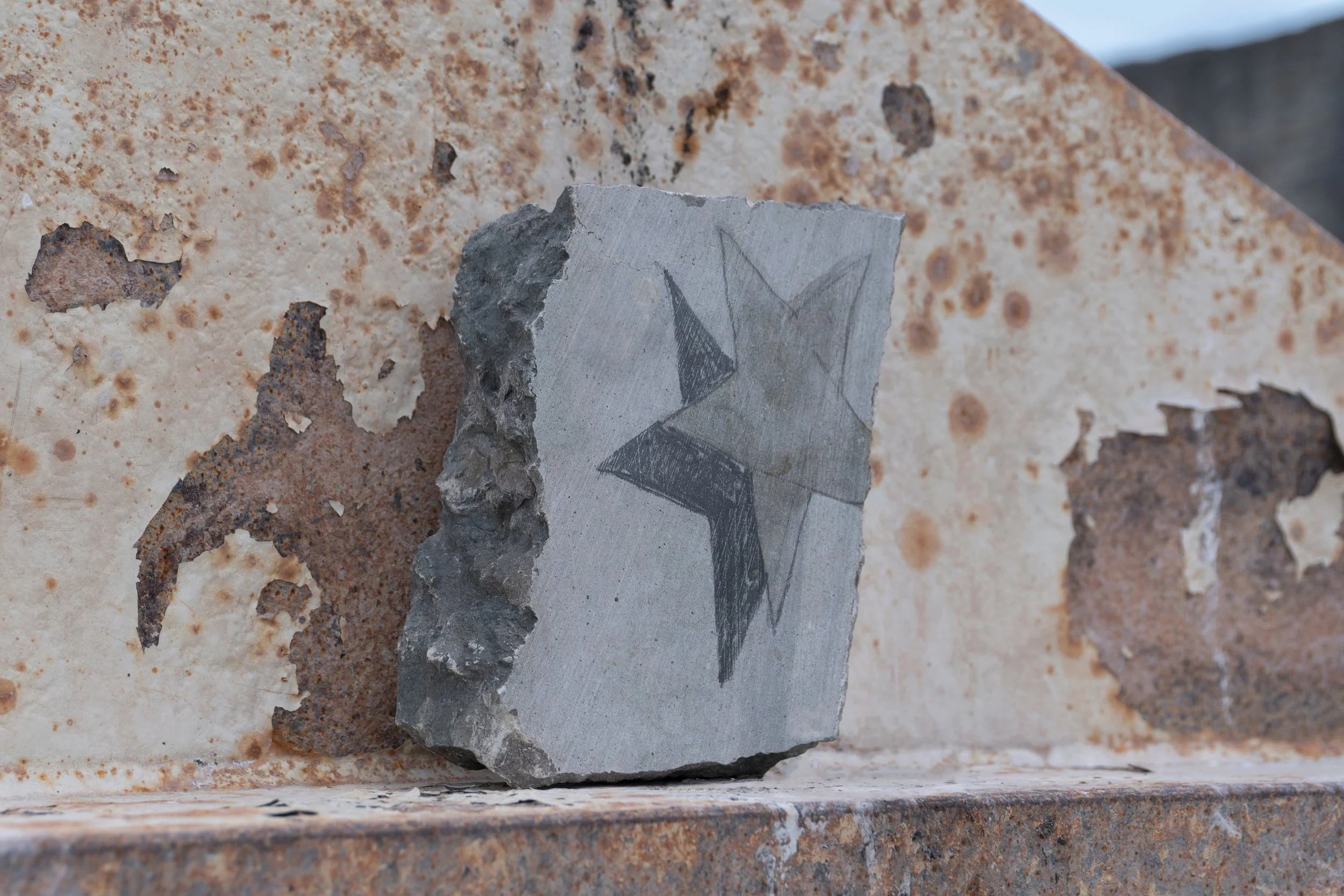 In the Bag of Stars (V). 
Graphite and acid on lime stone. 