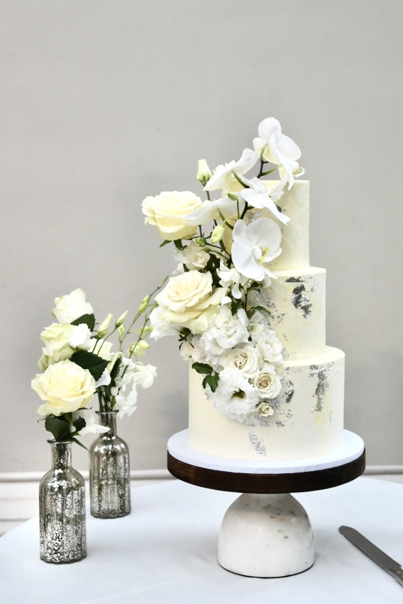 Made by Adele elegant floral white orchid wedding cake.jpg