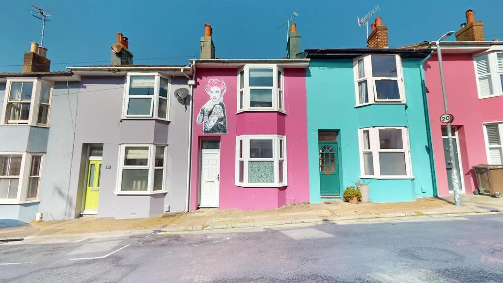 photo showing a typical colourful Brighton terraced street