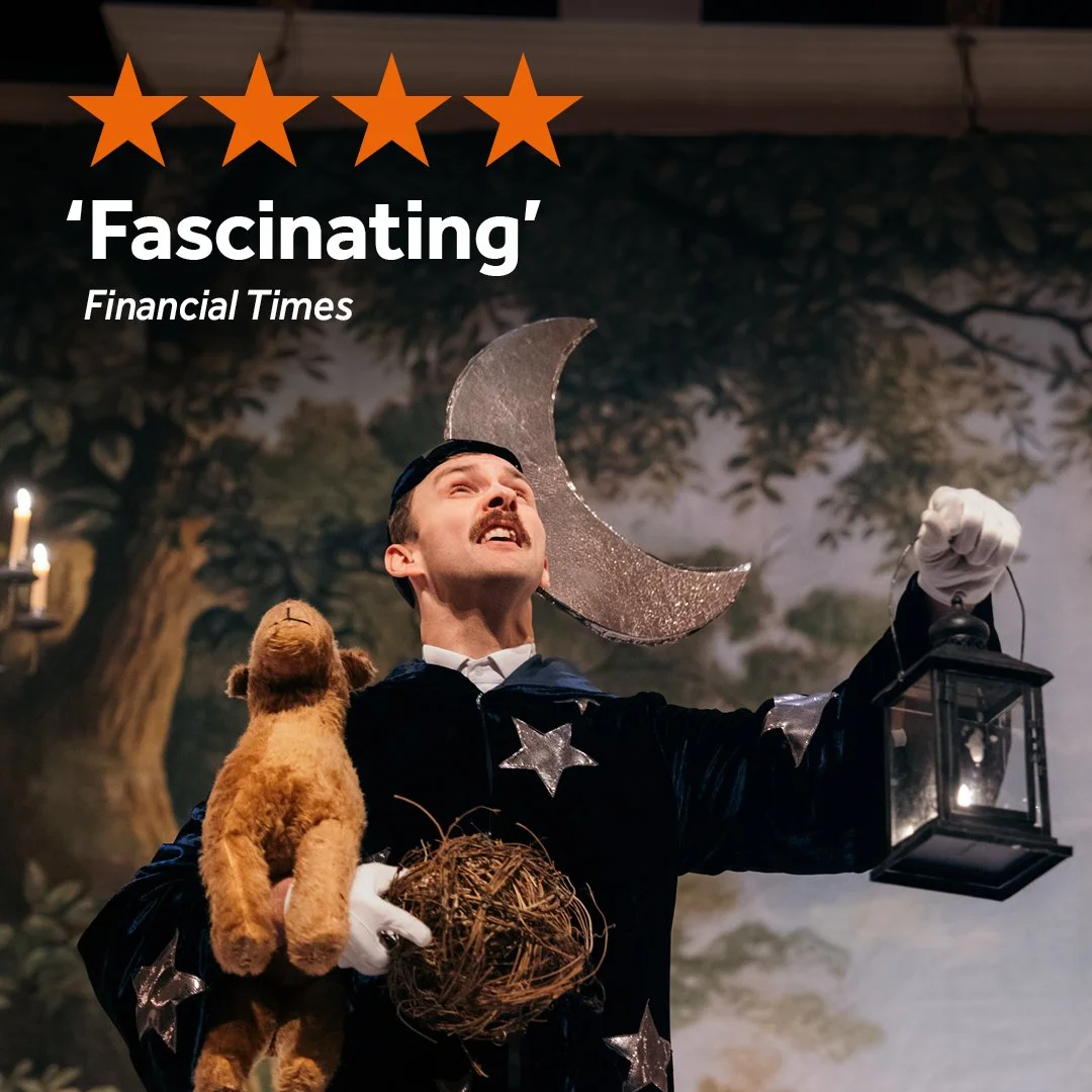 Character wearing a costume with a moon hat and a teddy bear. Imposed over the top is 4 stars "Fascinating" Financial Times
