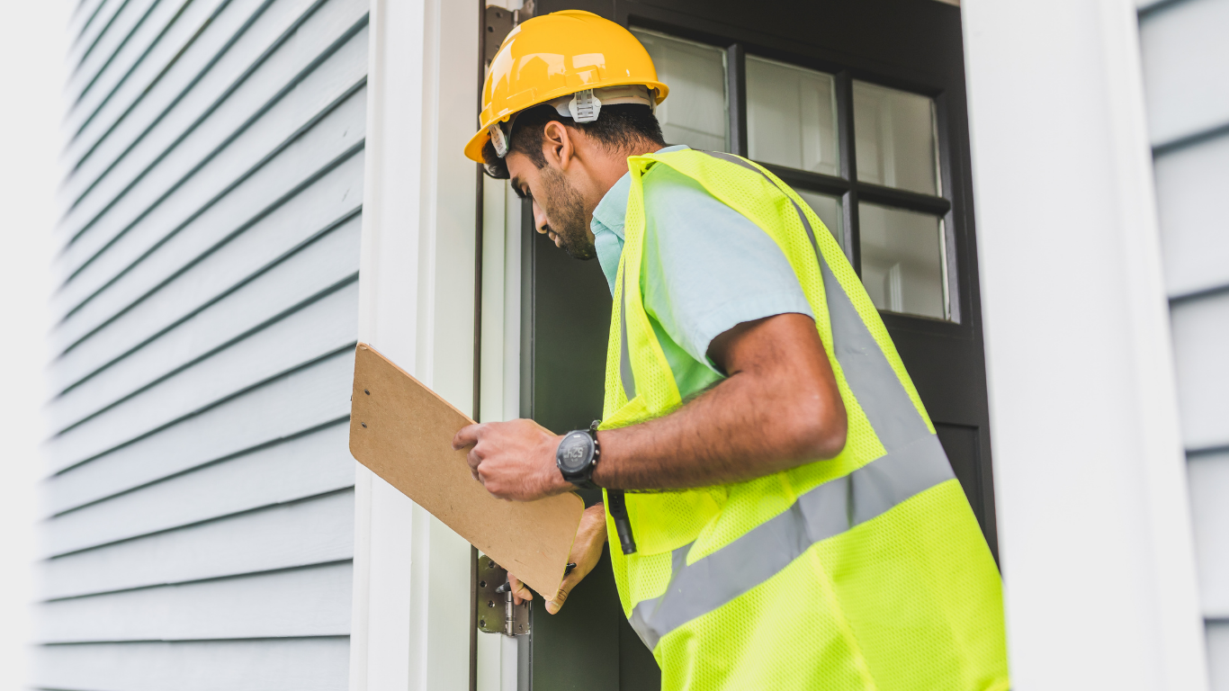 Real estate investor inspecting a property during a fix-and-flip walkthrough.