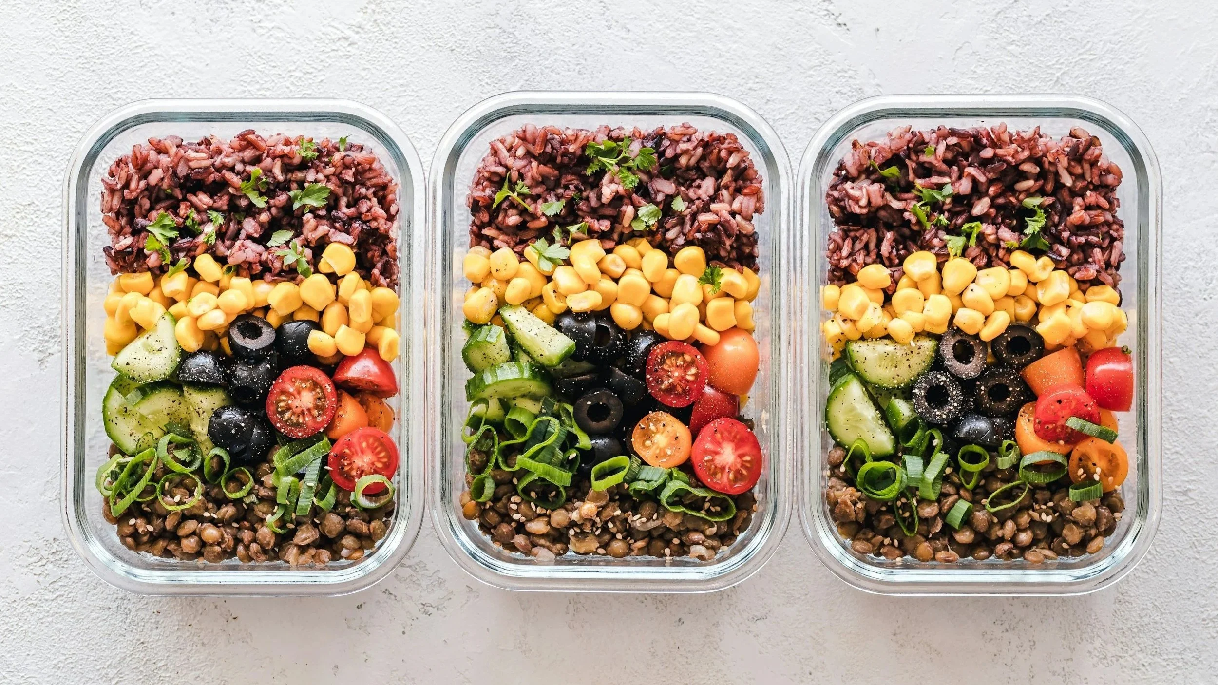 Three containers of prepared high-magnesium foods